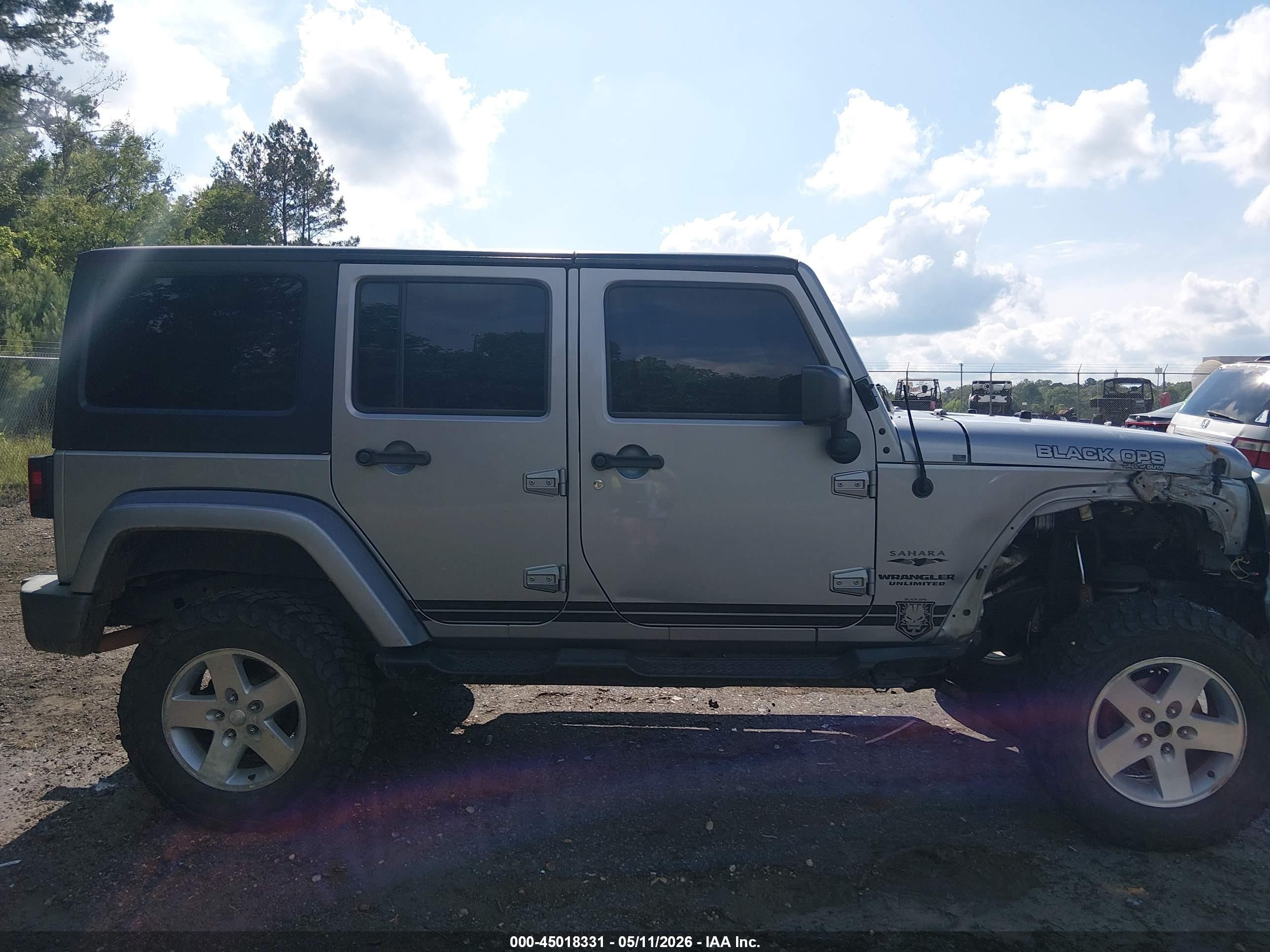 2015 Jeep Wrangler Unlimited Sahara Silver vin: 1C4BJWEGXFL555267