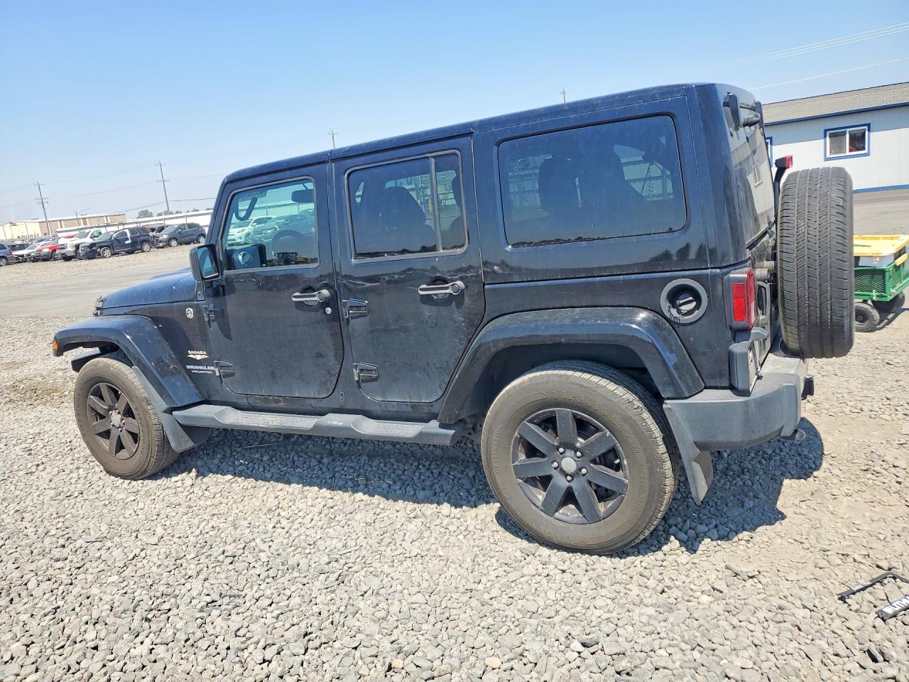 2015 Jeep Wrangler Unlimited Sahara Black vin: 1C4BJWEGXFL717575