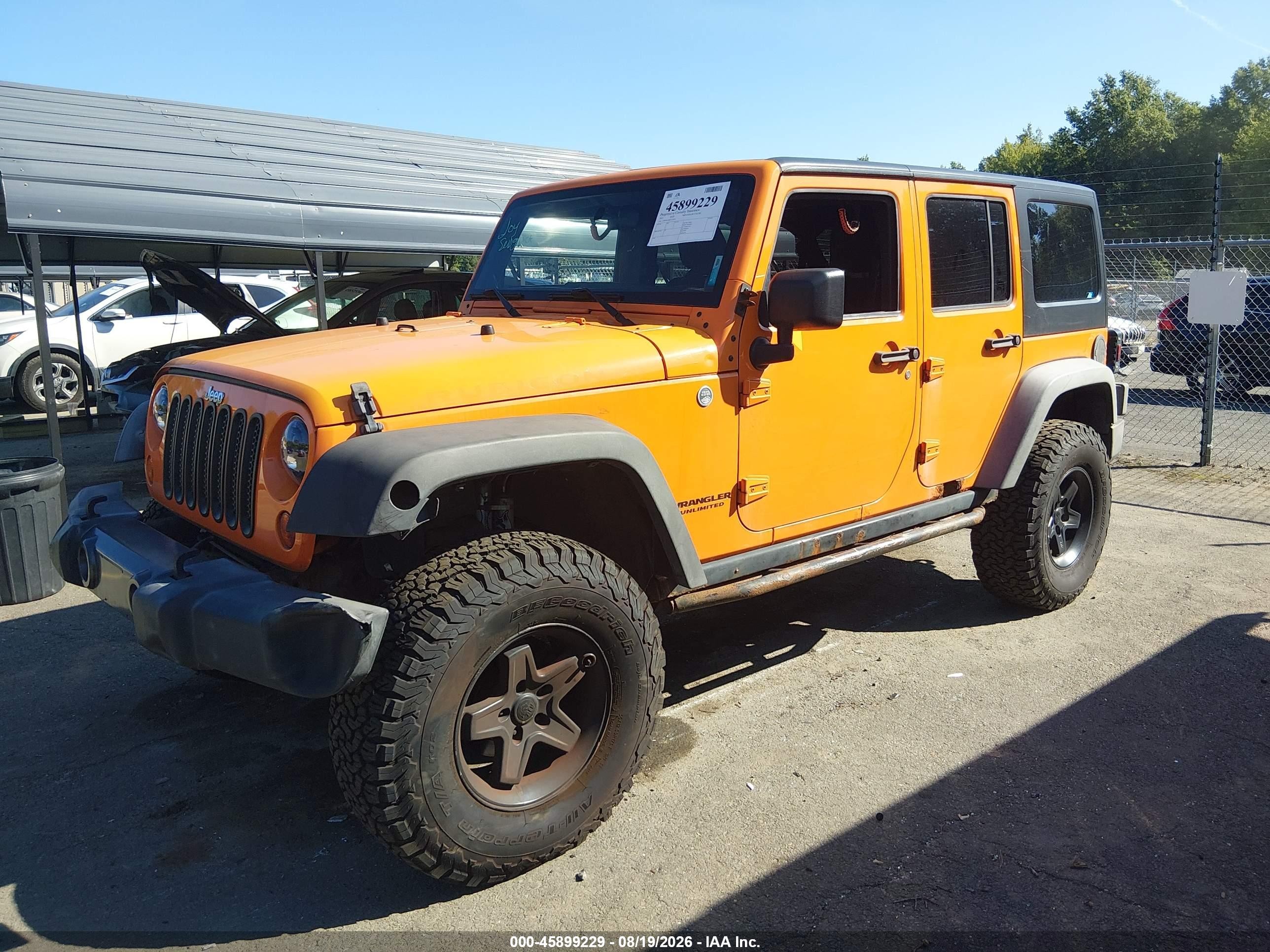 2012 Jeep Wrangler Unlimited Rubicon Orange vin: 1C4BJWFG0CL131977