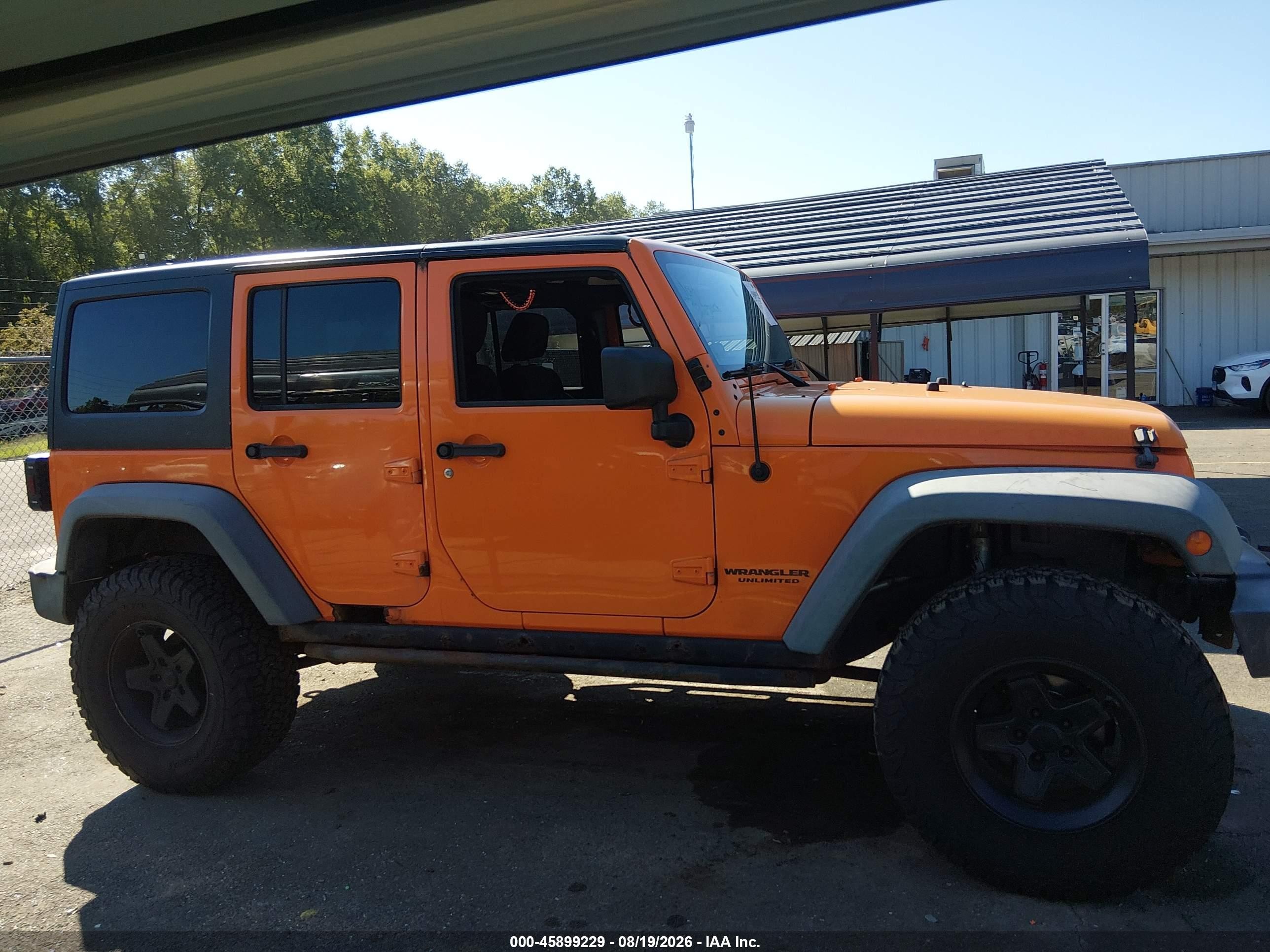 2012 Jeep Wrangler Unlimited Rubicon Orange vin: 1C4BJWFG0CL131977