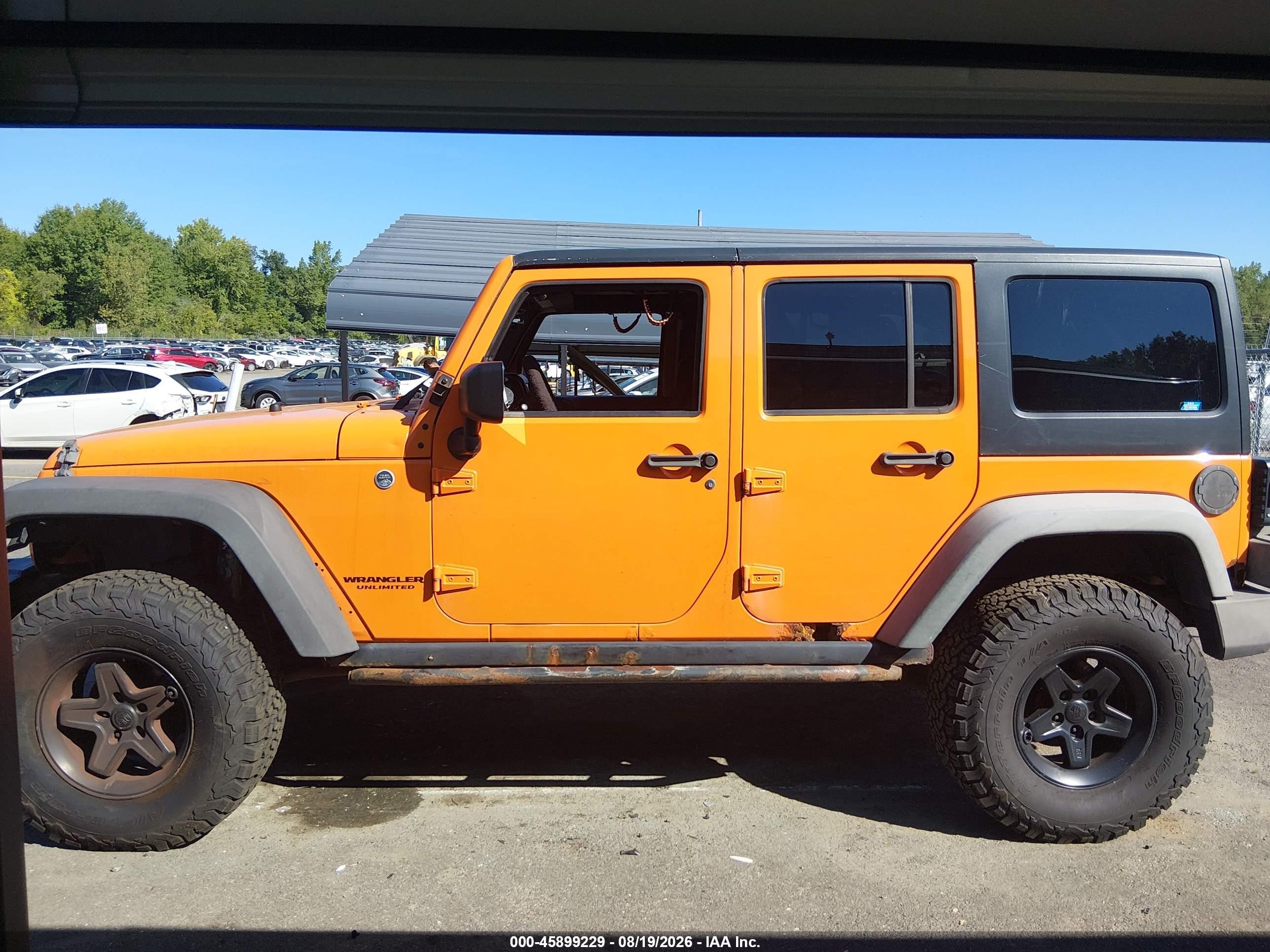 2012 Jeep Wrangler Unlimited Rubicon Orange vin: 1C4BJWFG0CL131977