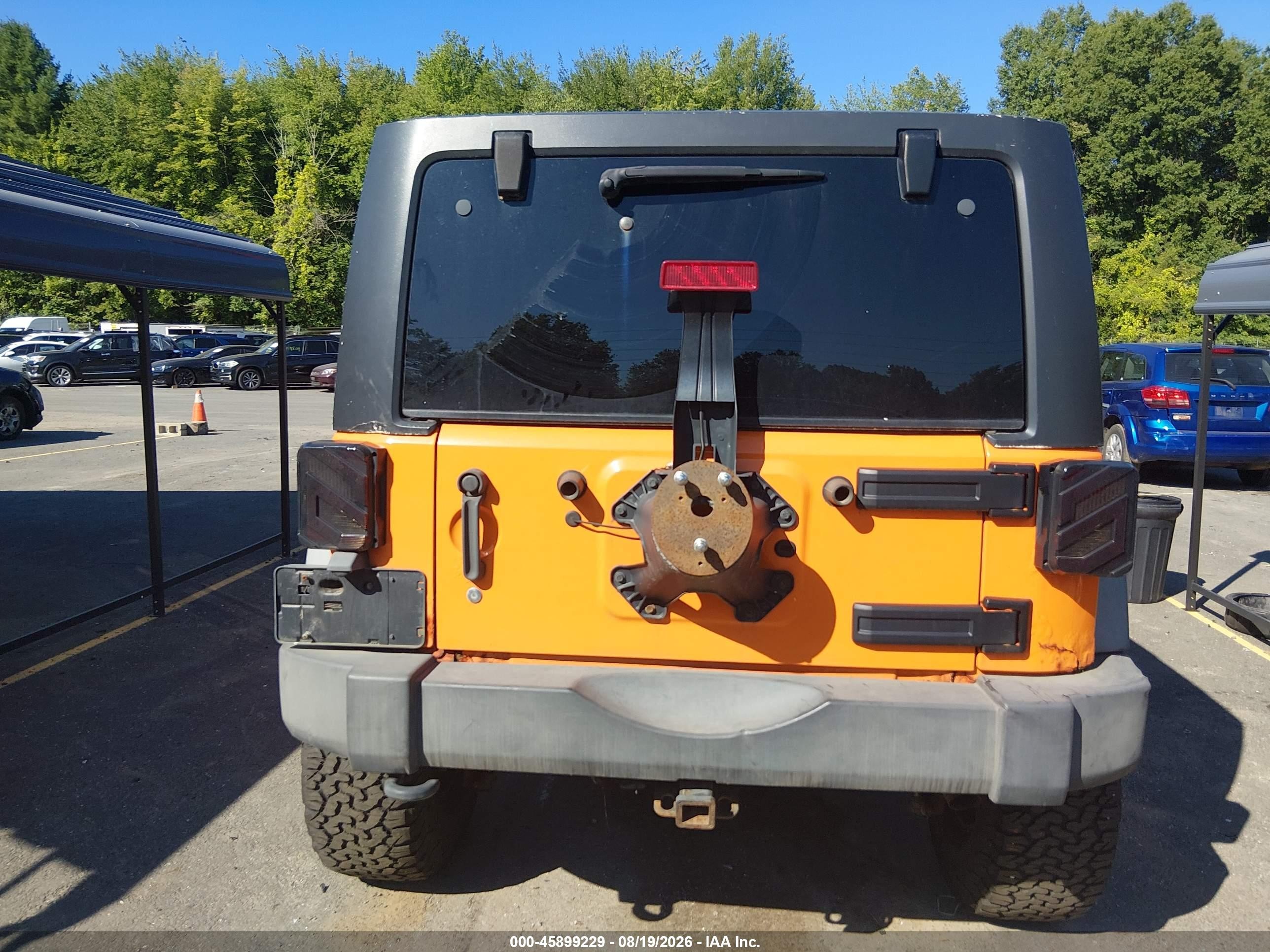 2012 Jeep Wrangler Unlimited Rubicon Orange vin: 1C4BJWFG0CL131977