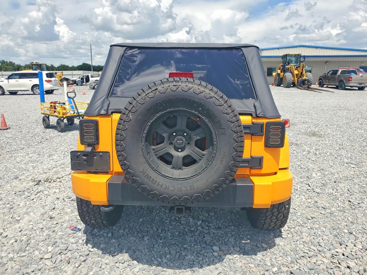 2013 Jeep Wrangler Unlimited Rubicon Оранжевый vin: 1C4BJWFG0DL513153