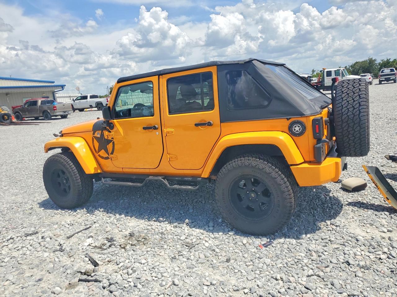 2013 Jeep Wrangler Unlimited Rubicon Оранжевый vin: 1C4BJWFG0DL513153