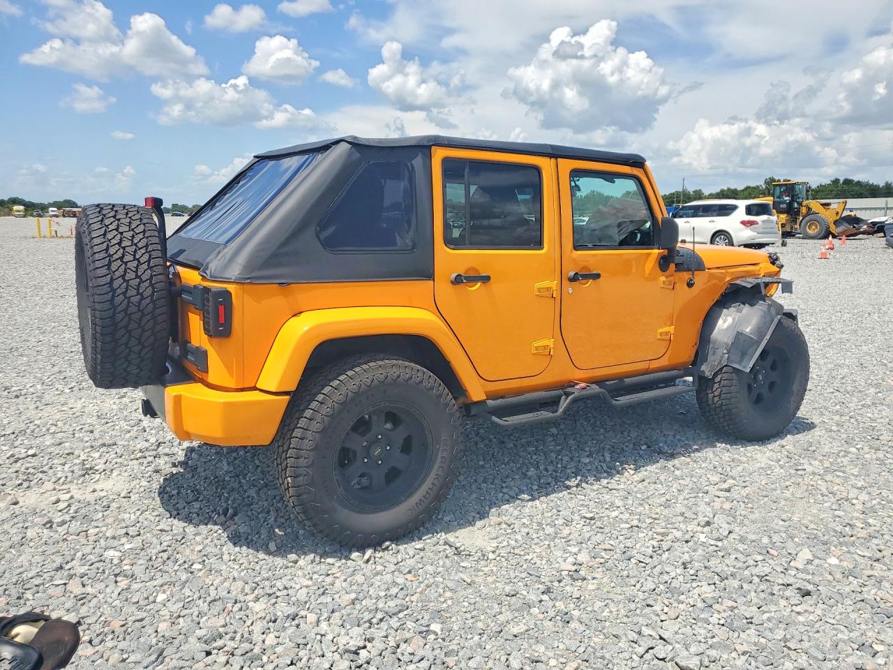 2013 Jeep Wrangler Unlimited Rubicon Оранжевый vin: 1C4BJWFG0DL513153
