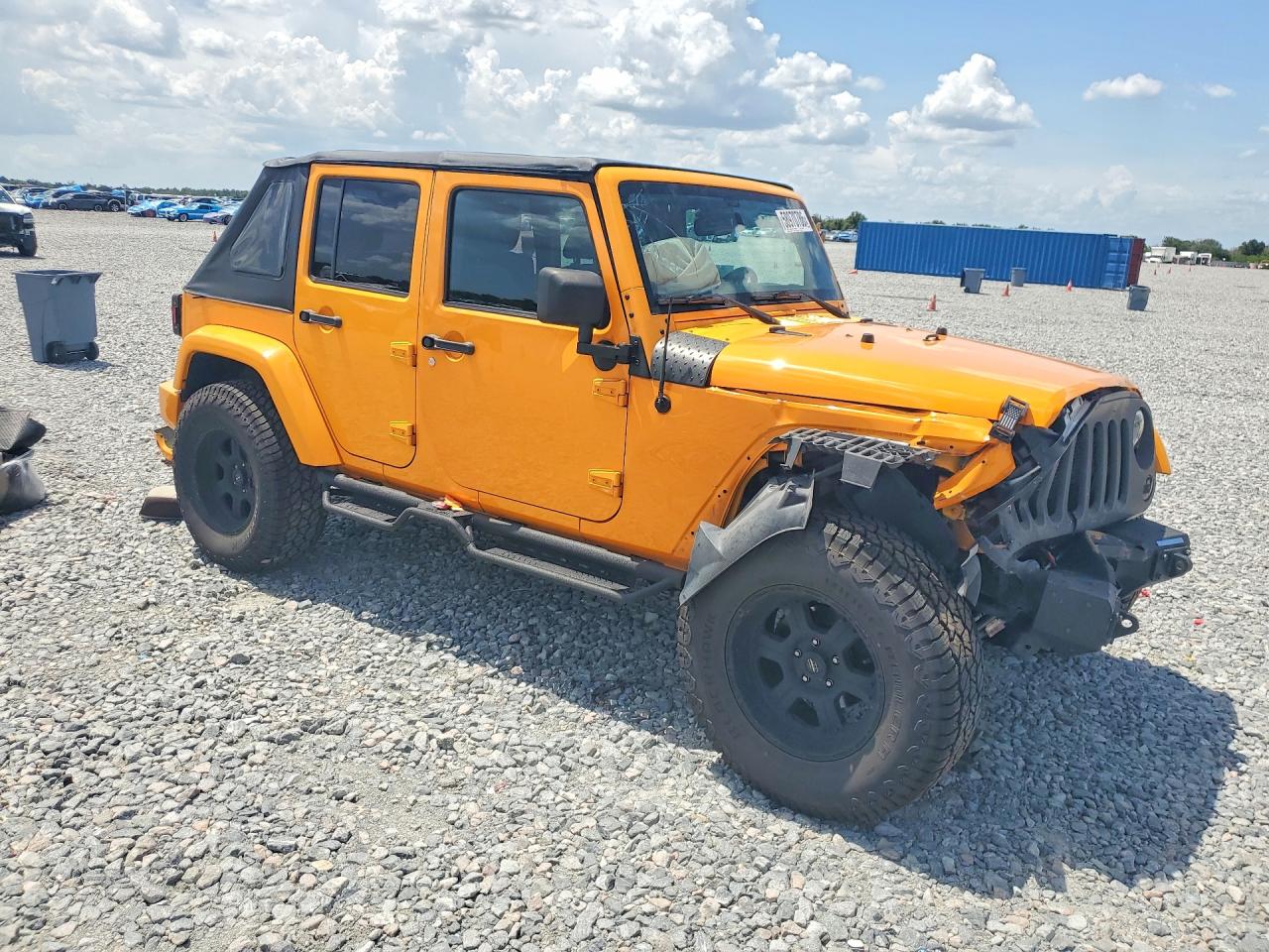 2013 Jeep Wrangler Unlimited Rubicon Оранжевый vin: 1C4BJWFG0DL513153
