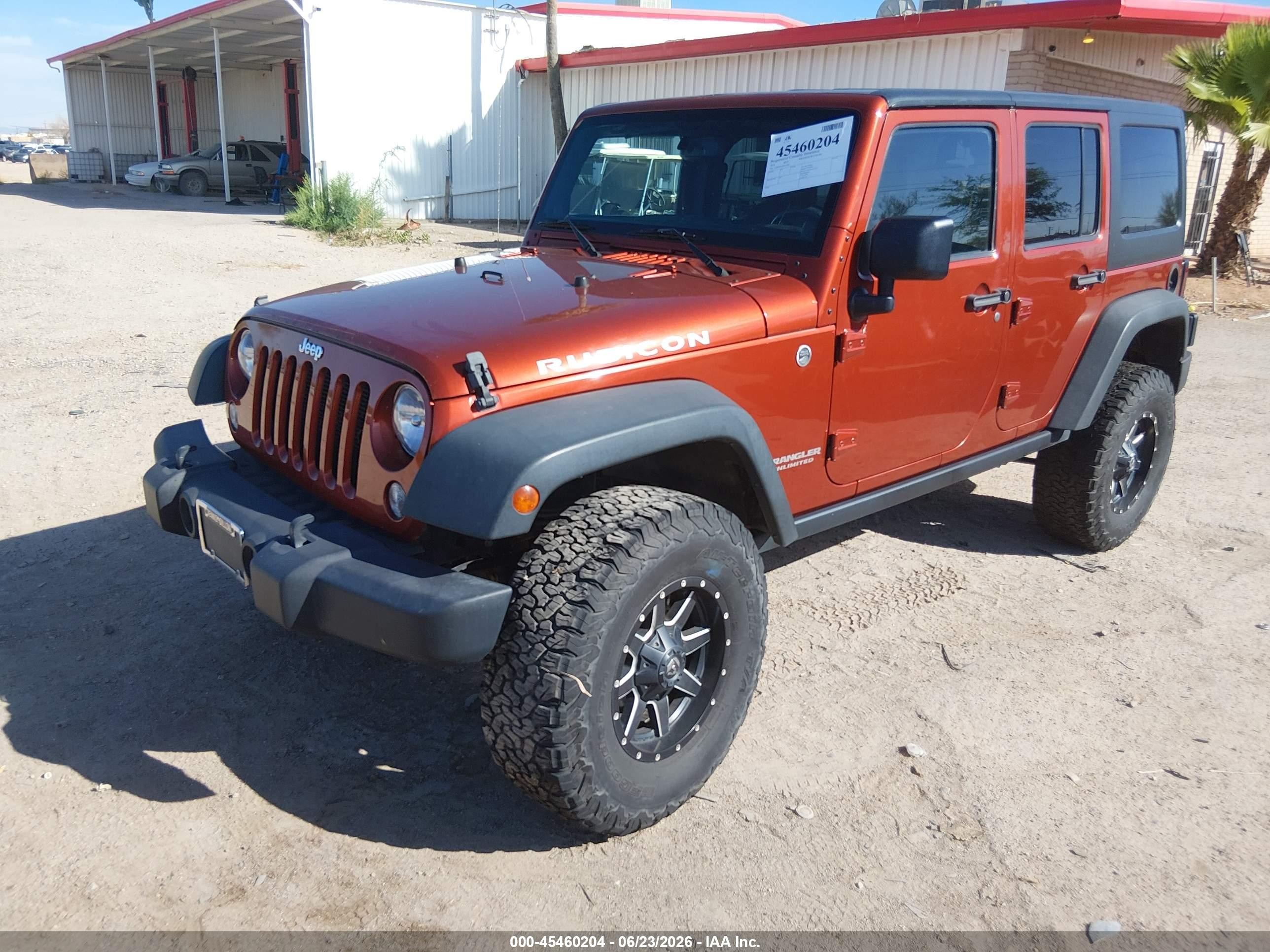 2014 Jeep Wrangler Unlimited Rubicon Orange vin: 1C4BJWFG0EL170331
