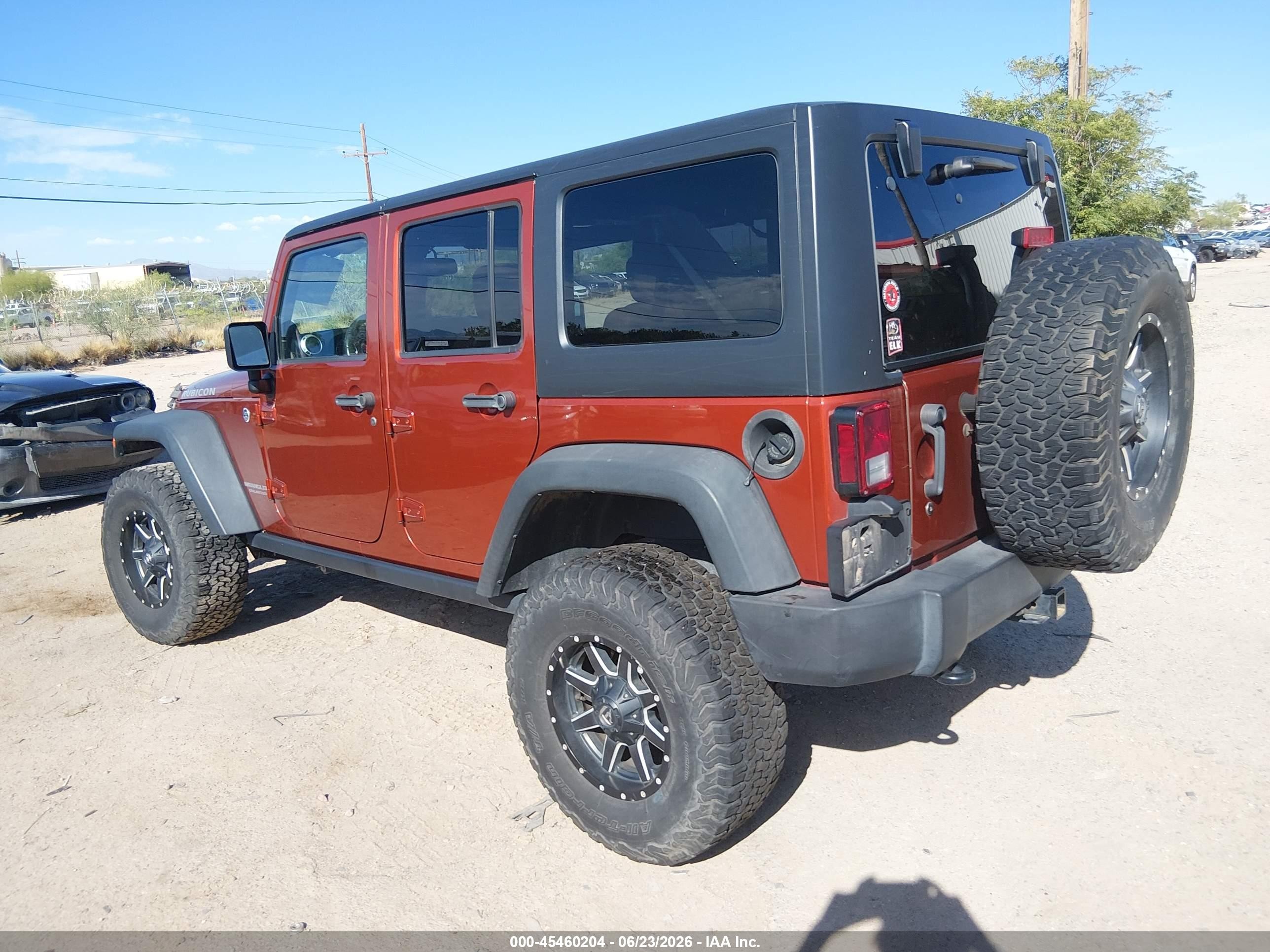 2014 Jeep Wrangler Unlimited Rubicon Orange vin: 1C4BJWFG0EL170331