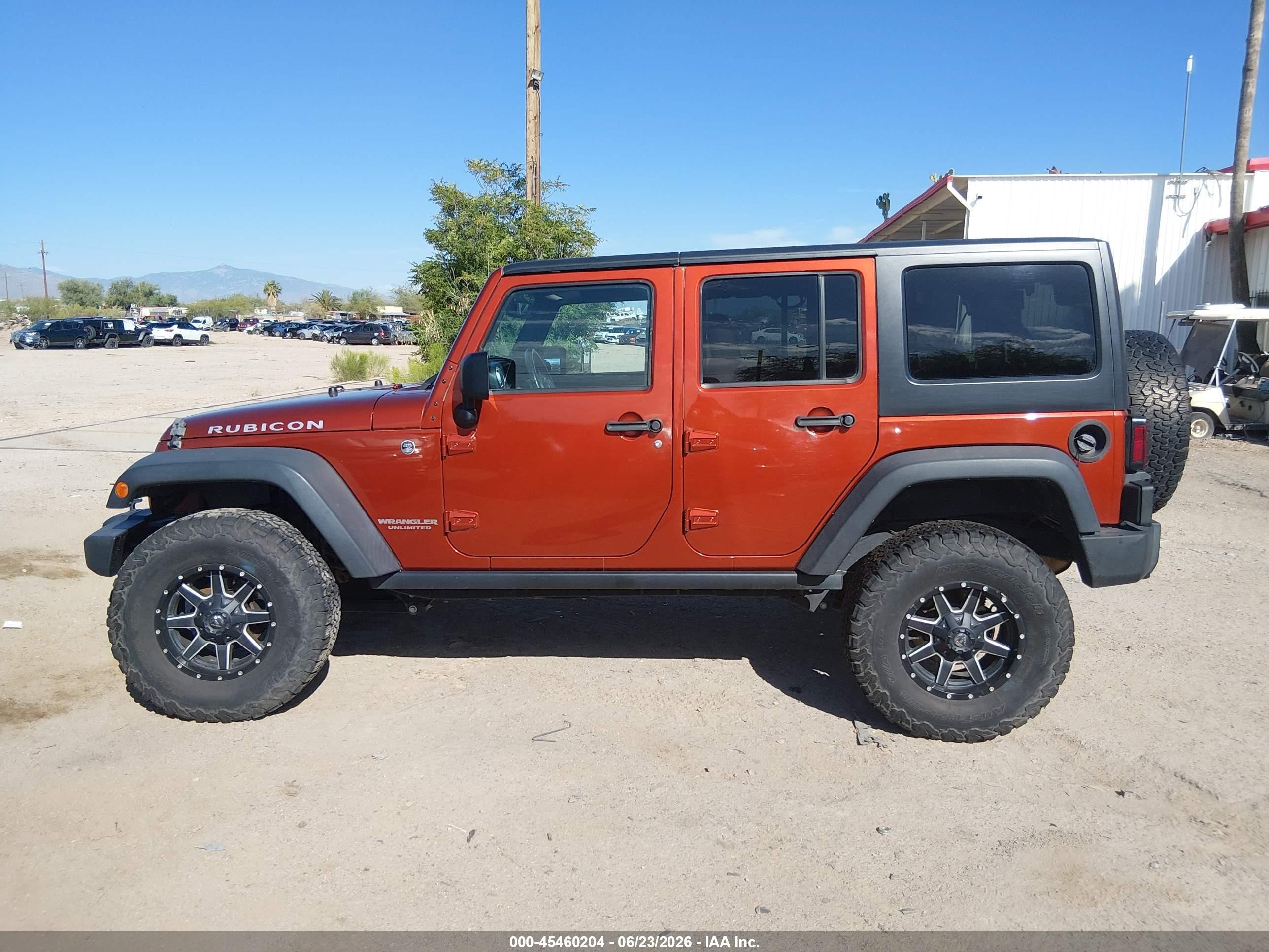 2014 Jeep Wrangler Unlimited Rubicon Orange vin: 1C4BJWFG0EL170331