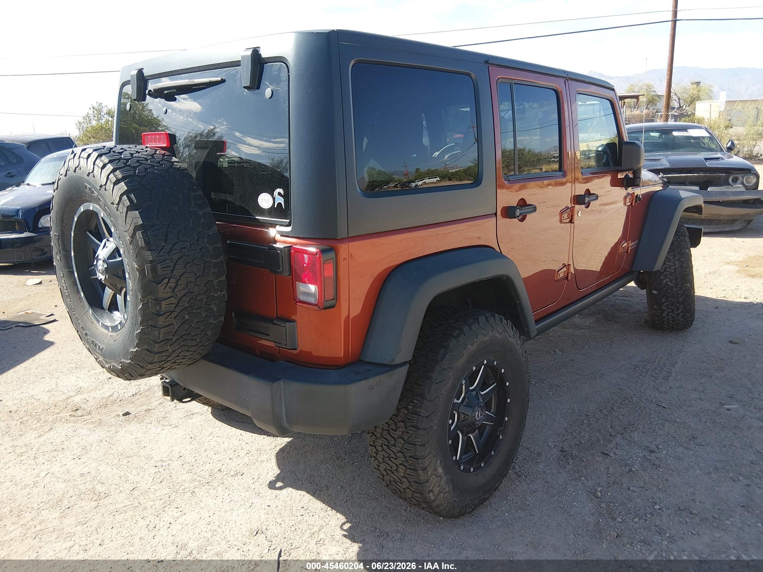 2014 Jeep Wrangler Unlimited Rubicon Orange vin: 1C4BJWFG0EL170331