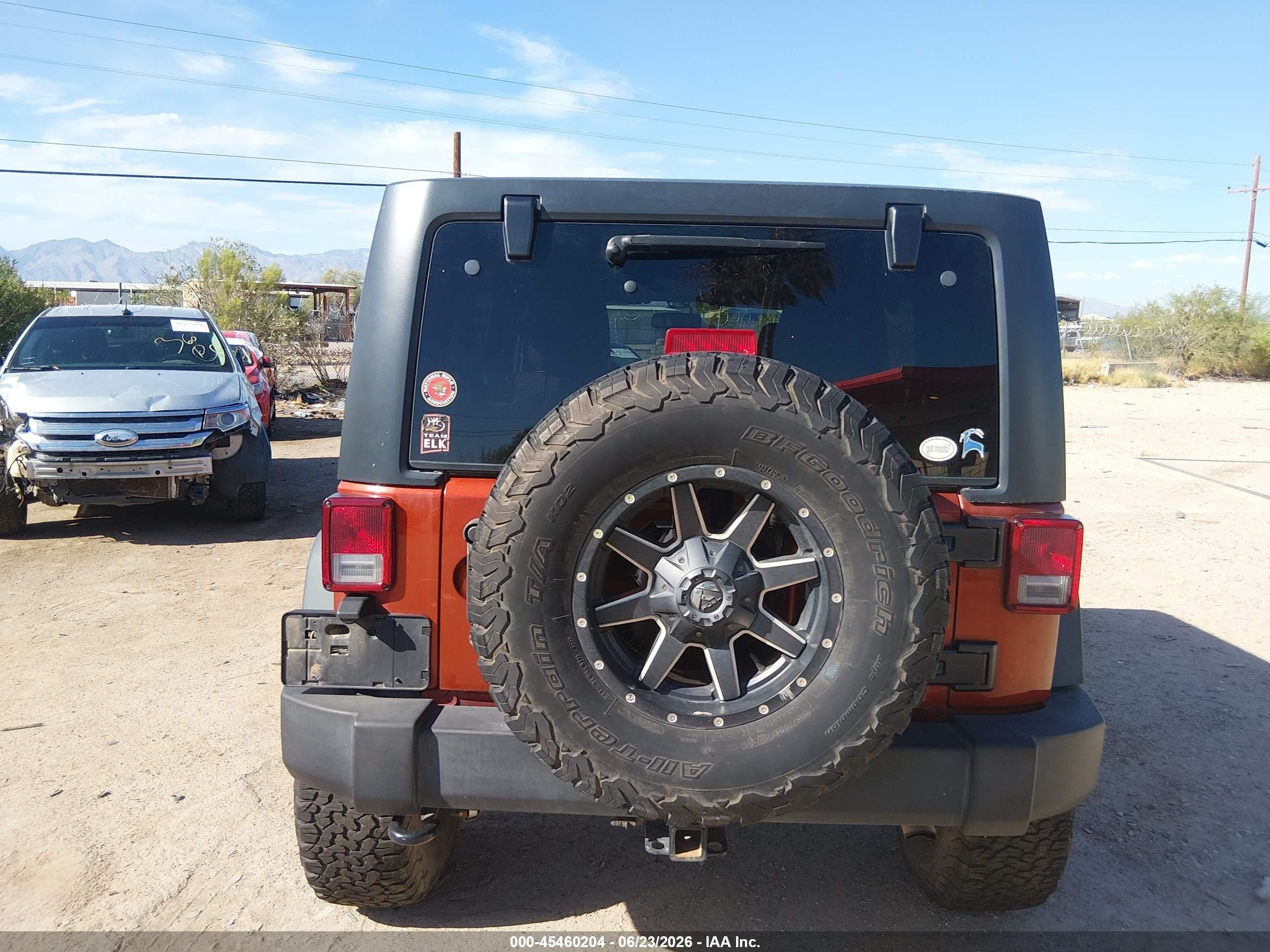 2014 Jeep Wrangler Unlimited Rubicon Orange vin: 1C4BJWFG0EL170331