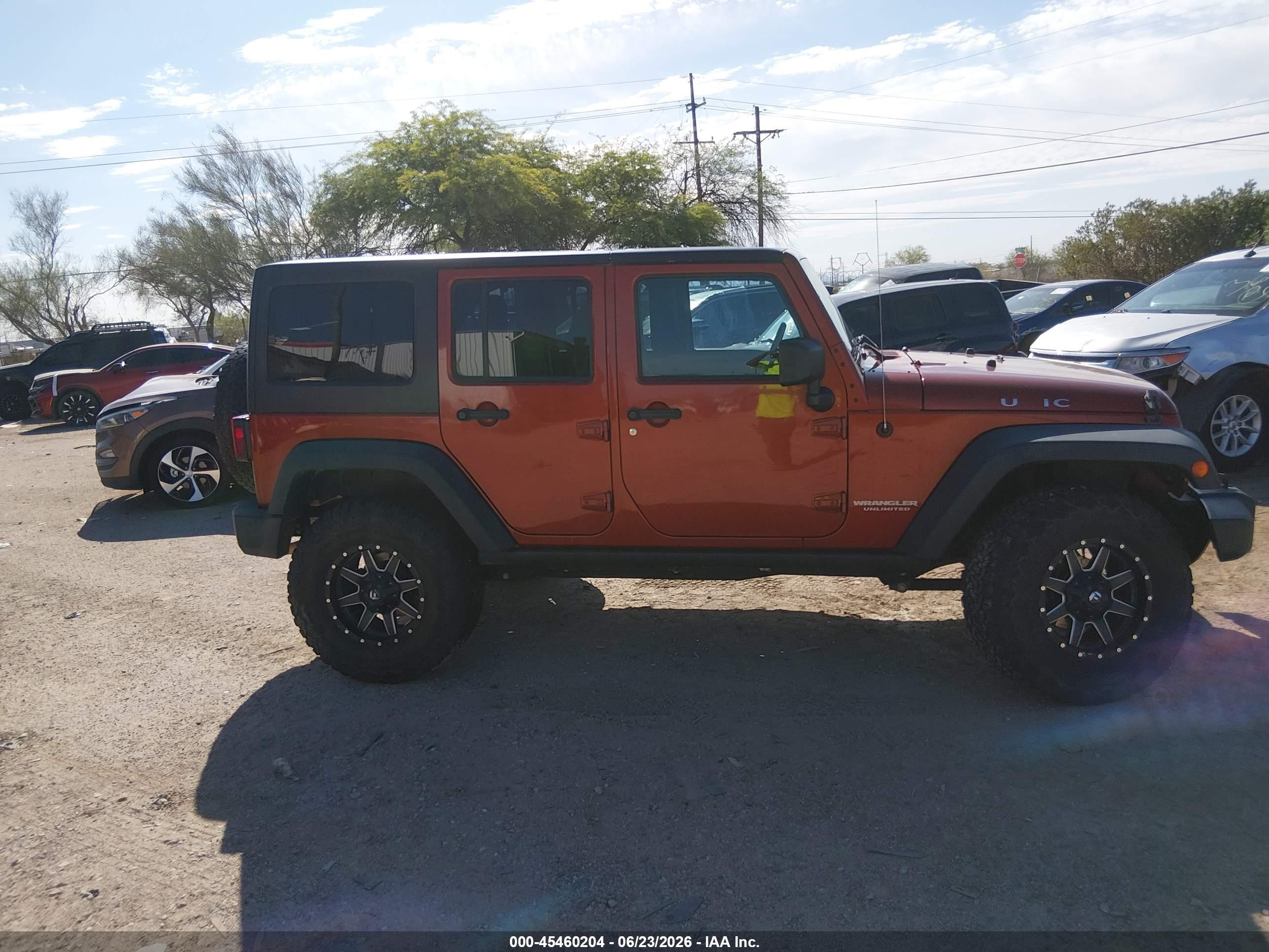 2014 Jeep Wrangler Unlimited Rubicon Orange vin: 1C4BJWFG0EL170331