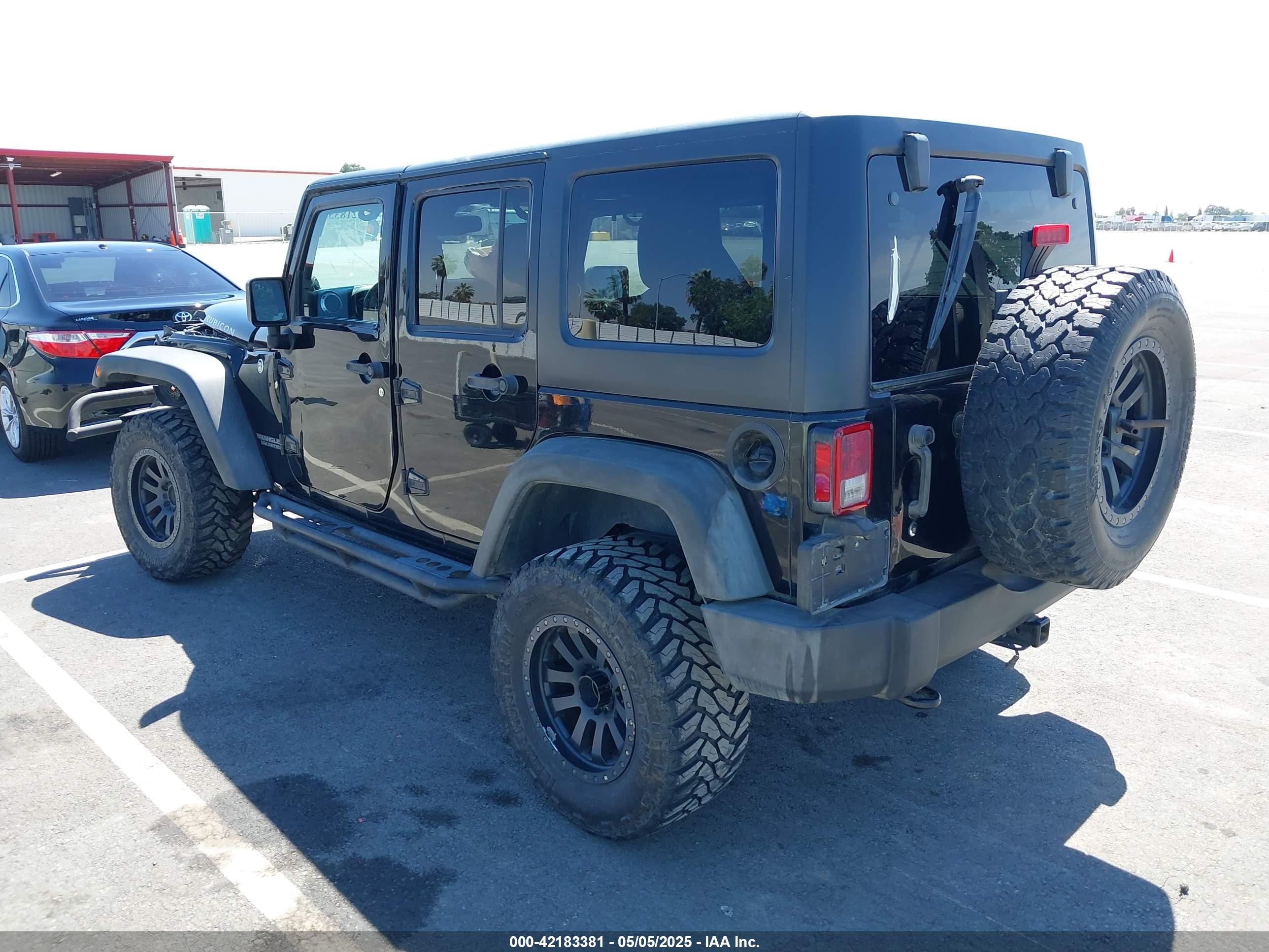2014 Jeep Wrangler Unlimited Rubicon Black vin: 1C4BJWFG0EL246503