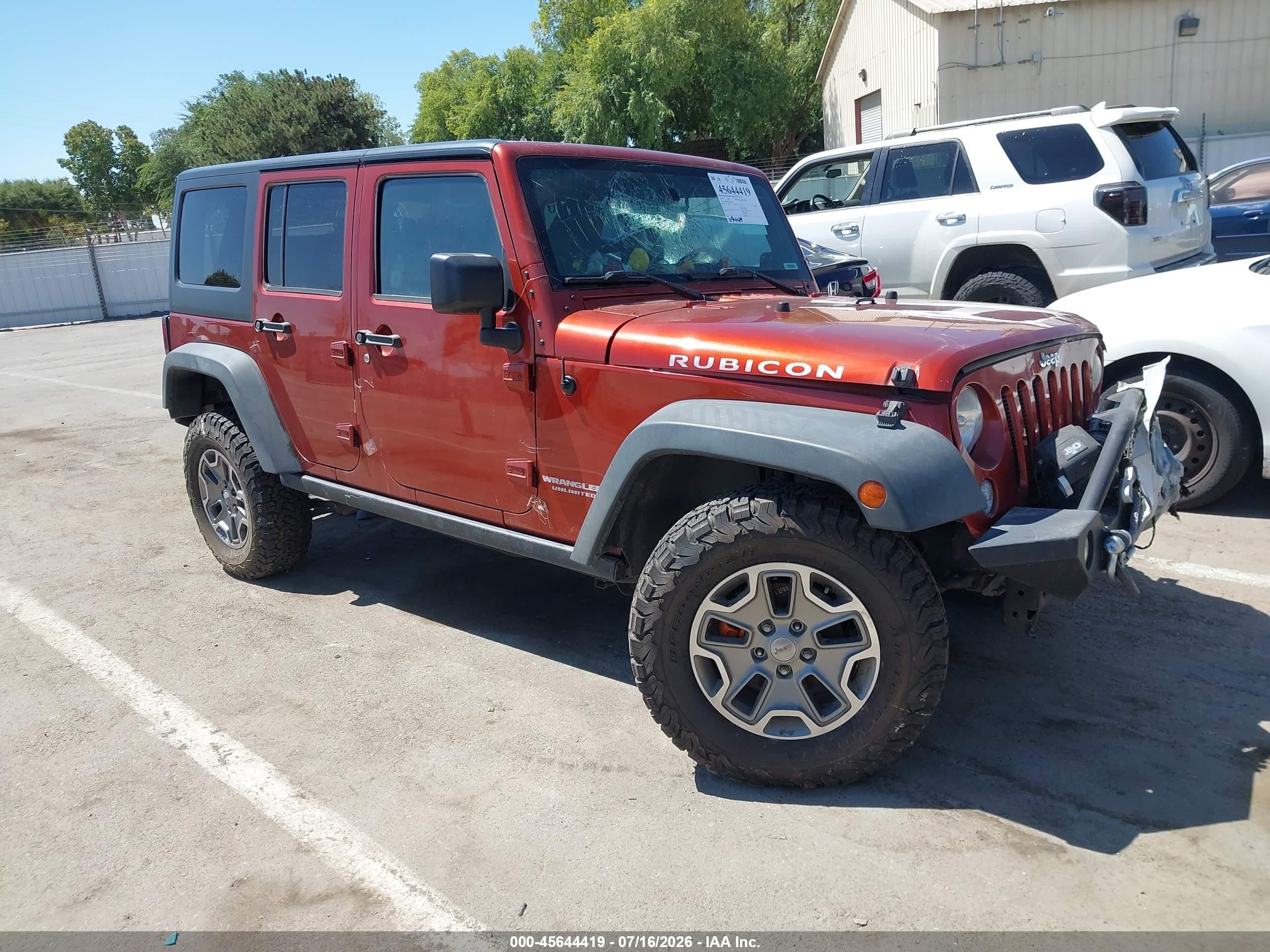 2014 Jeep Wrangler Unlimited Rubicon Orange vin: 1C4BJWFG0EL303363
