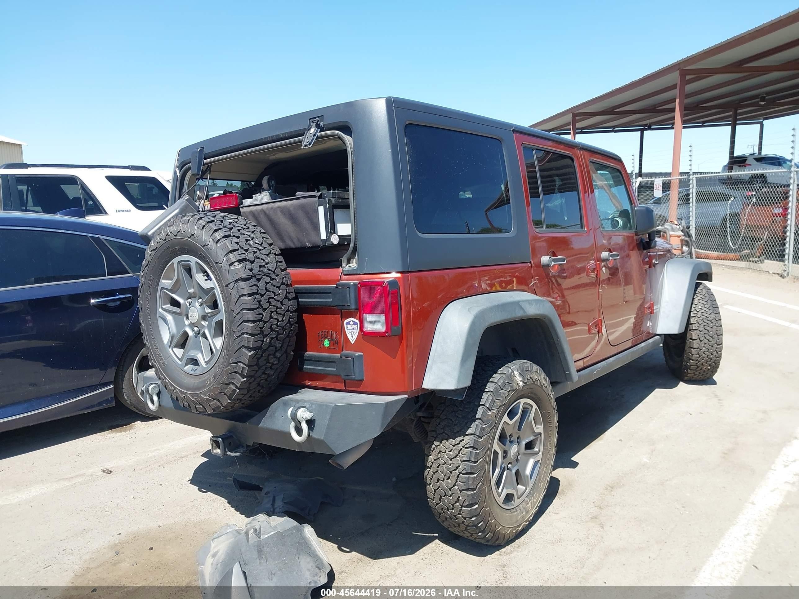 2014 Jeep Wrangler Unlimited Rubicon Orange vin: 1C4BJWFG0EL303363