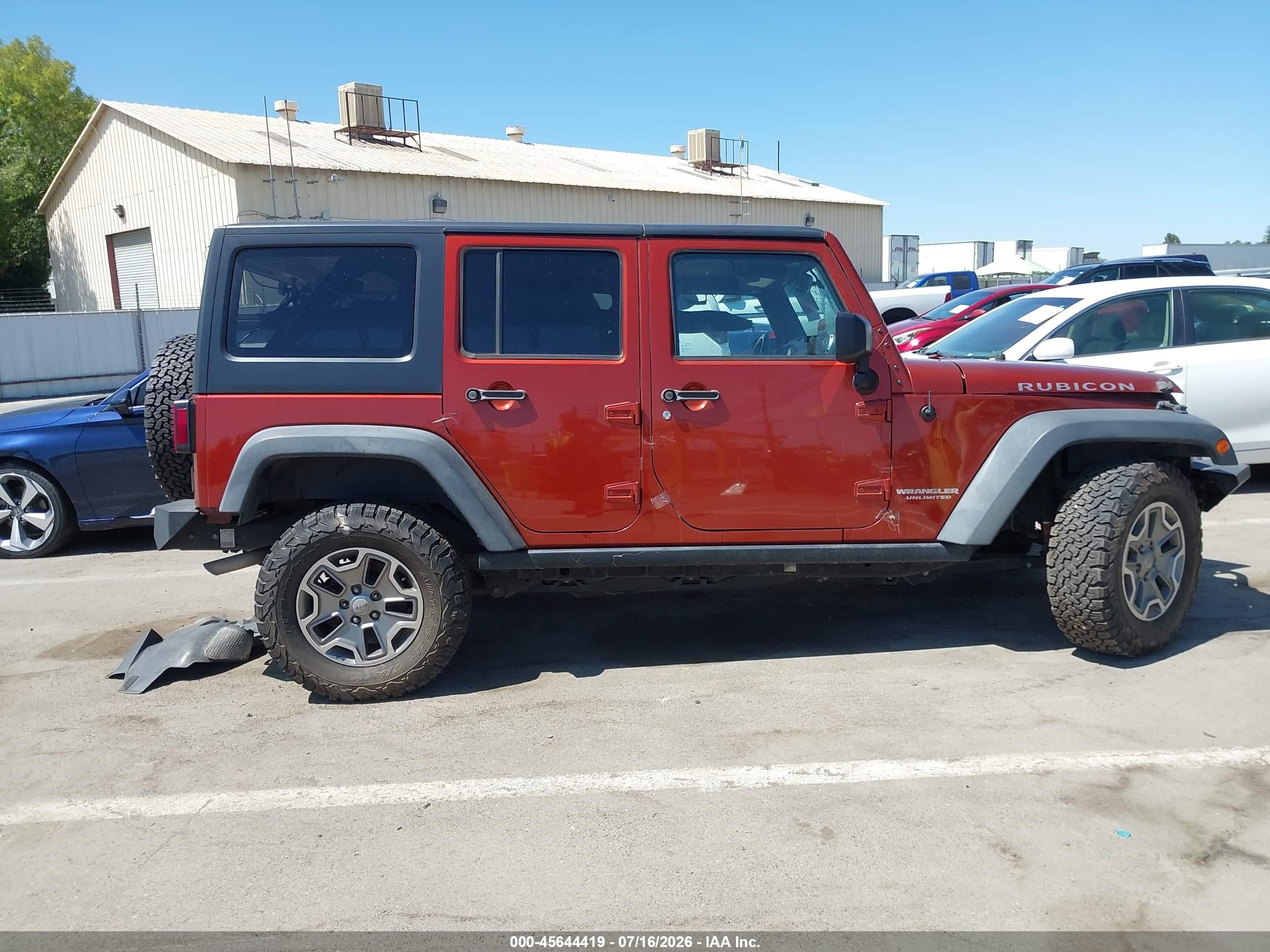 2014 Jeep Wrangler Unlimited Rubicon Orange vin: 1C4BJWFG0EL303363