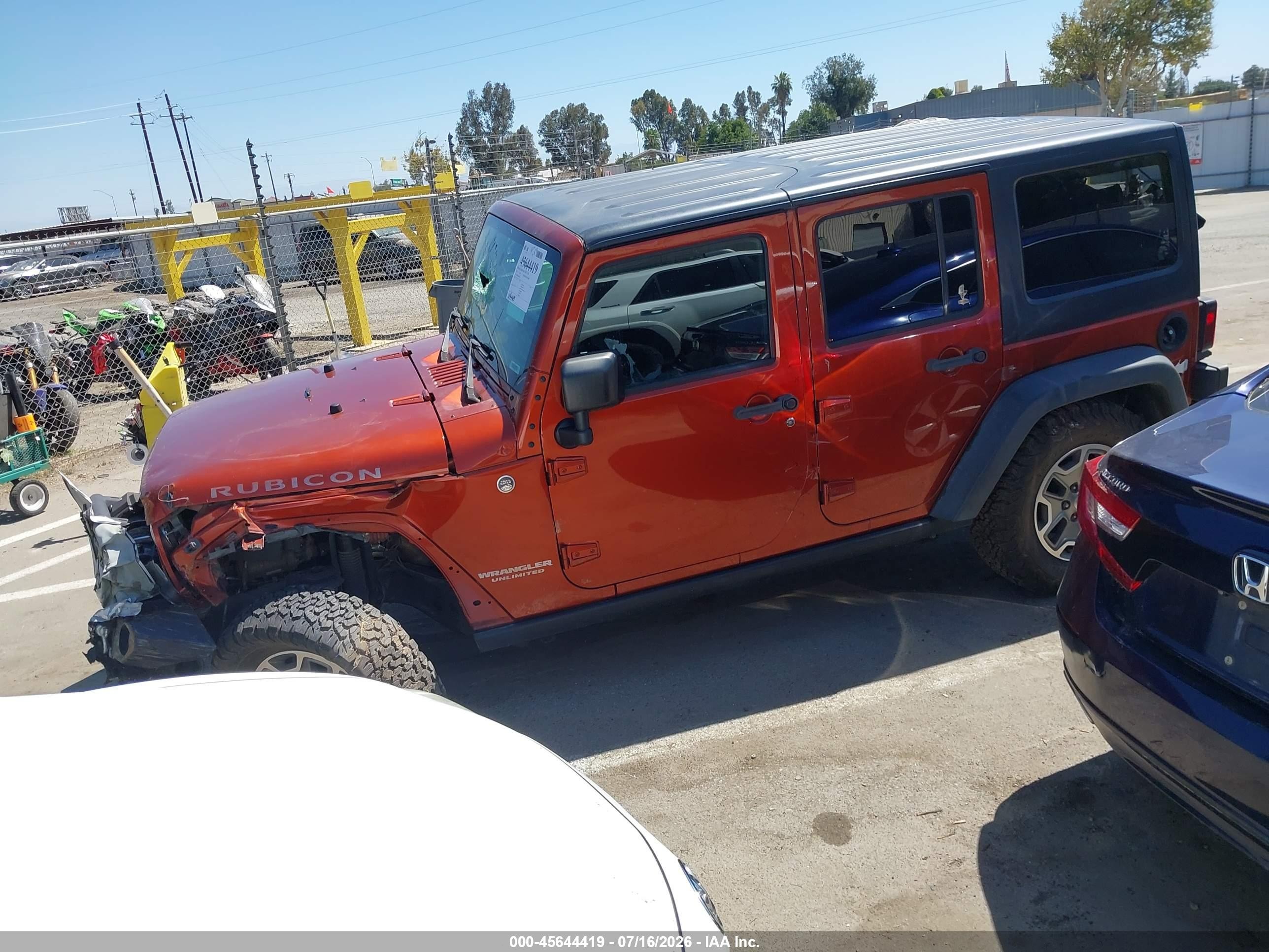 2014 Jeep Wrangler Unlimited Rubicon Orange vin: 1C4BJWFG0EL303363