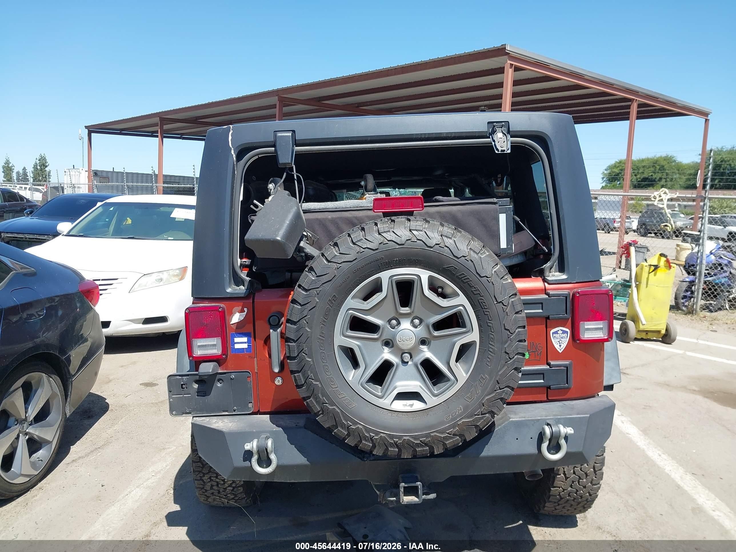 2014 Jeep Wrangler Unlimited Rubicon Orange vin: 1C4BJWFG0EL303363