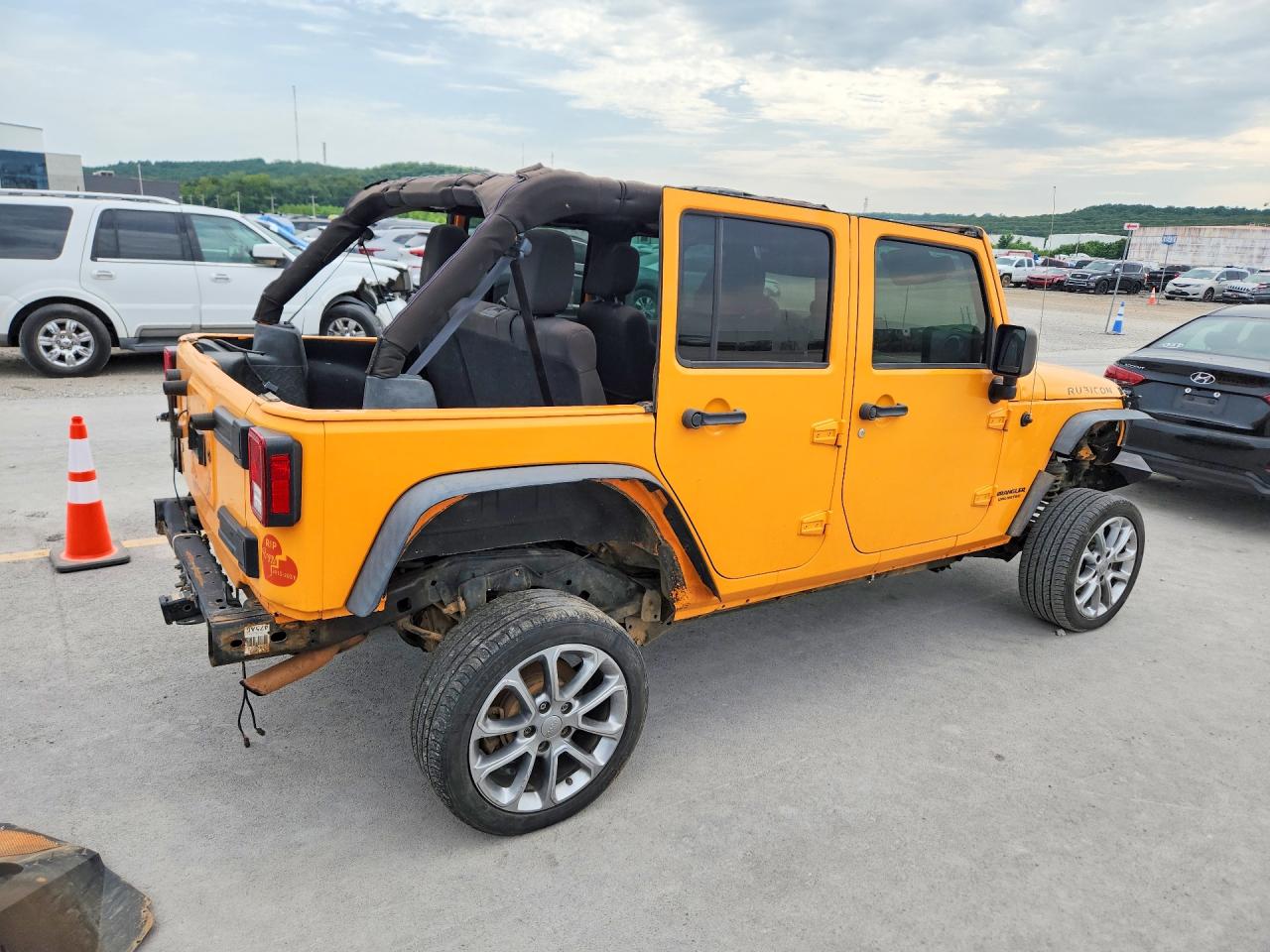 2012 Jeep Wrangler Unlimited Rubicon Yellow vin: 1C4BJWFG2CL155777