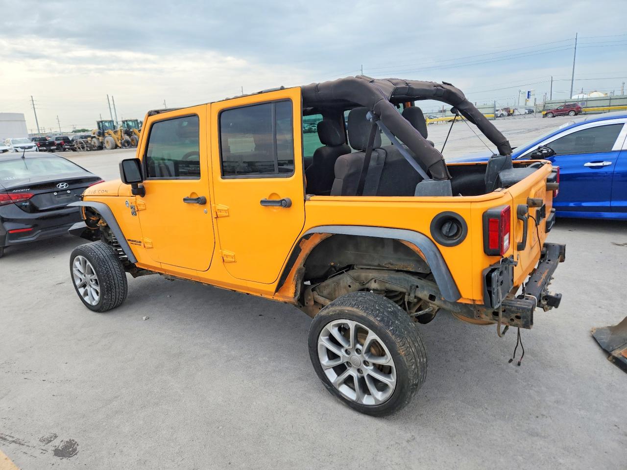2012 Jeep Wrangler Unlimited Rubicon Yellow vin: 1C4BJWFG2CL155777