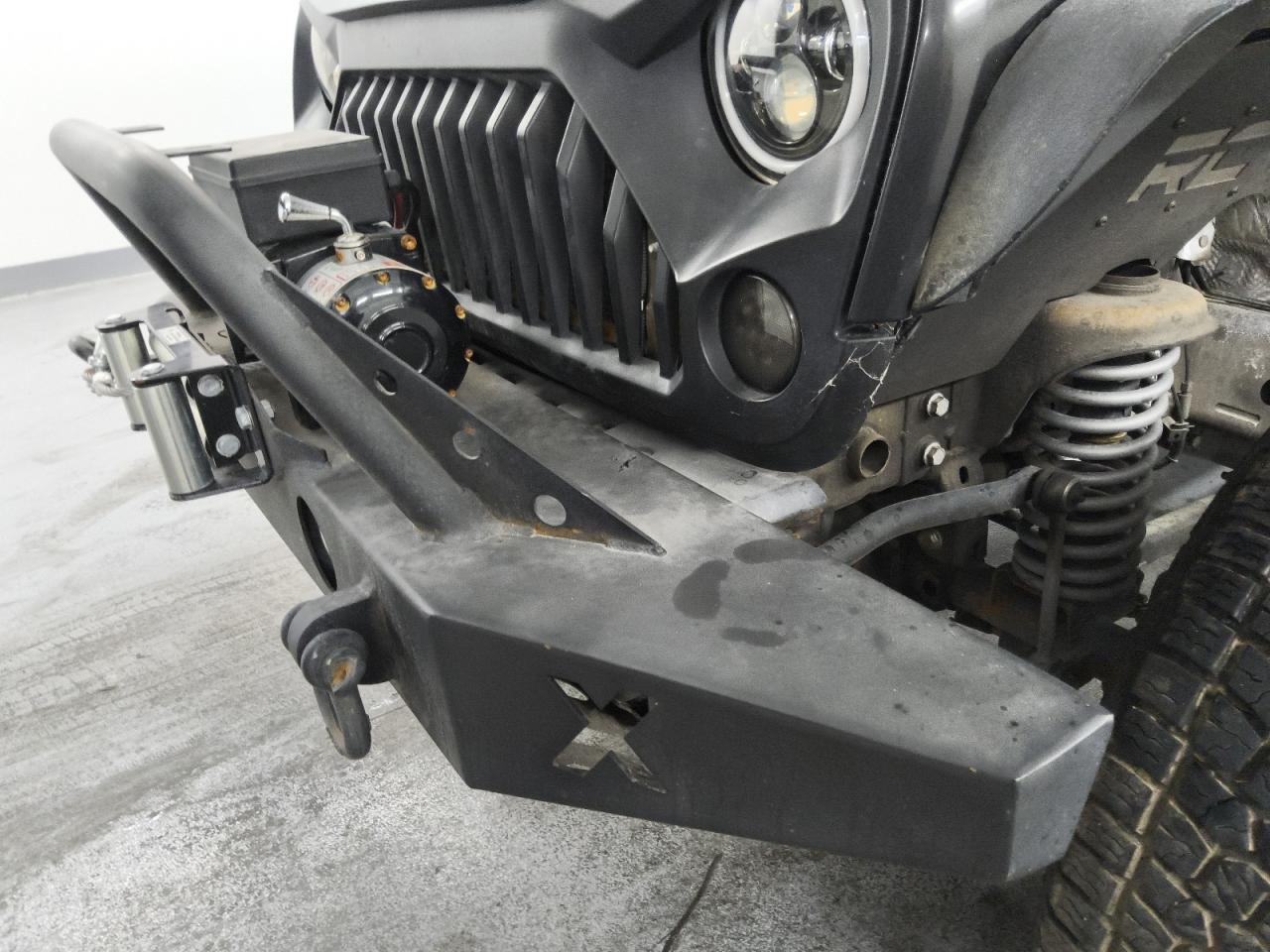 2013 Jeep Wrangler Unlimited Rubicon Black vin: 1C4BJWFG2DL699603 Damage: Front Metal Bumper Painted, Aftermarket, Acceptable