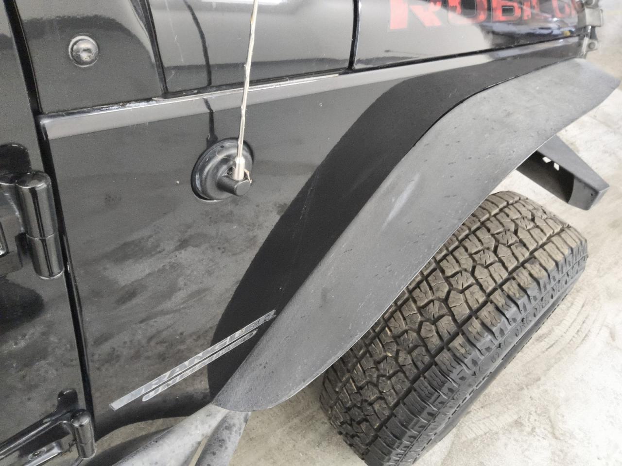 2013 Jeep Wrangler Unlimited Rubicon Black vin: 1C4BJWFG2DL699603 Damage: Right Front Fender, Heavy Scratch, 1/2 To 1 Inch
