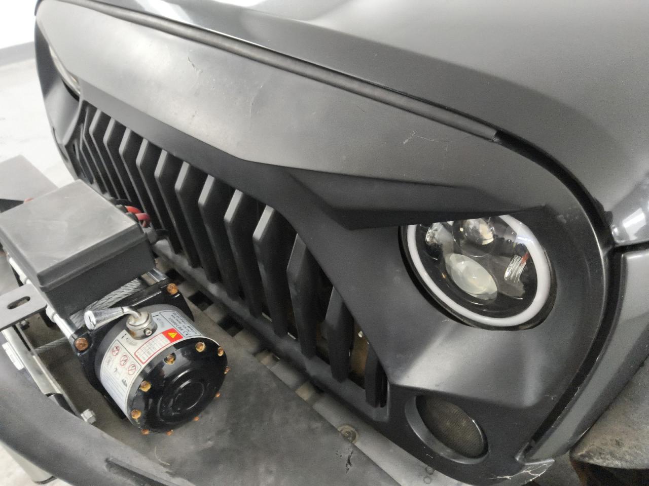 2013 Jeep Wrangler Unlimited Rubicon Black vin: 1C4BJWFG2DL699603 Damage: Grille, Aftermarket, Acceptable