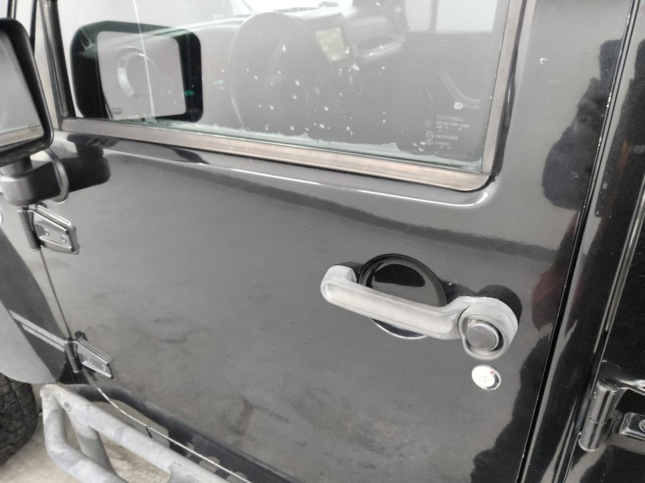 2013 Jeep Wrangler Unlimited Rubicon Black vin: 1C4BJWFG2DL699603 Damage: Left Front Door, Chipped, 2