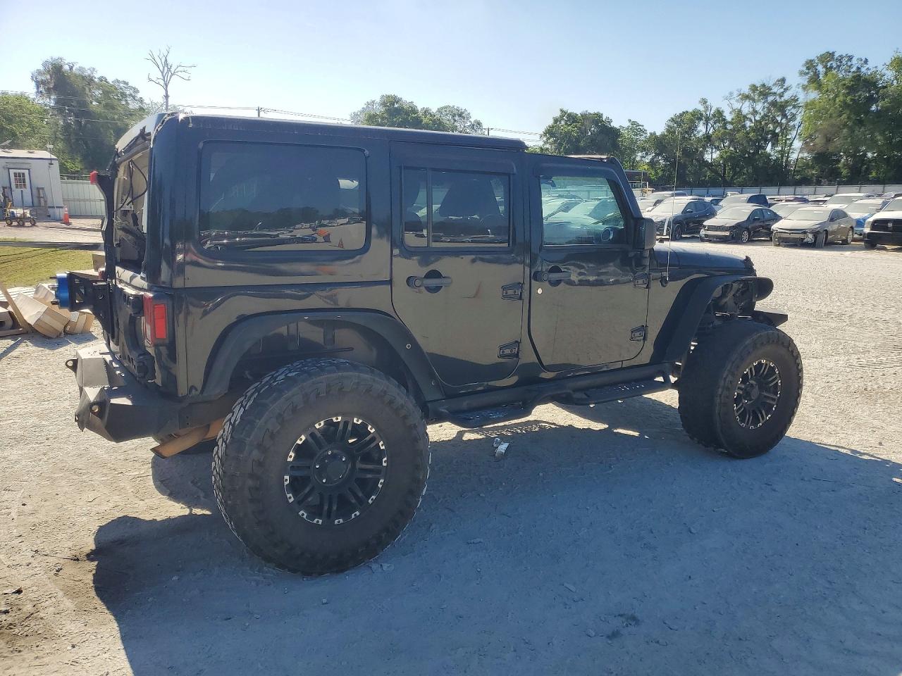 2012 Jeep Wrangler Unlimited Rubicon Черный vin: 1C4BJWFG3CL157554