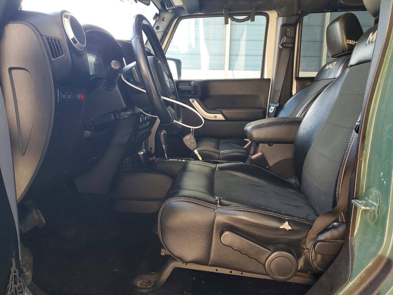 2012 Jeep Wrangler Unlimited Rubicon Two Tone vin: 1C4BJWFG4CL234609