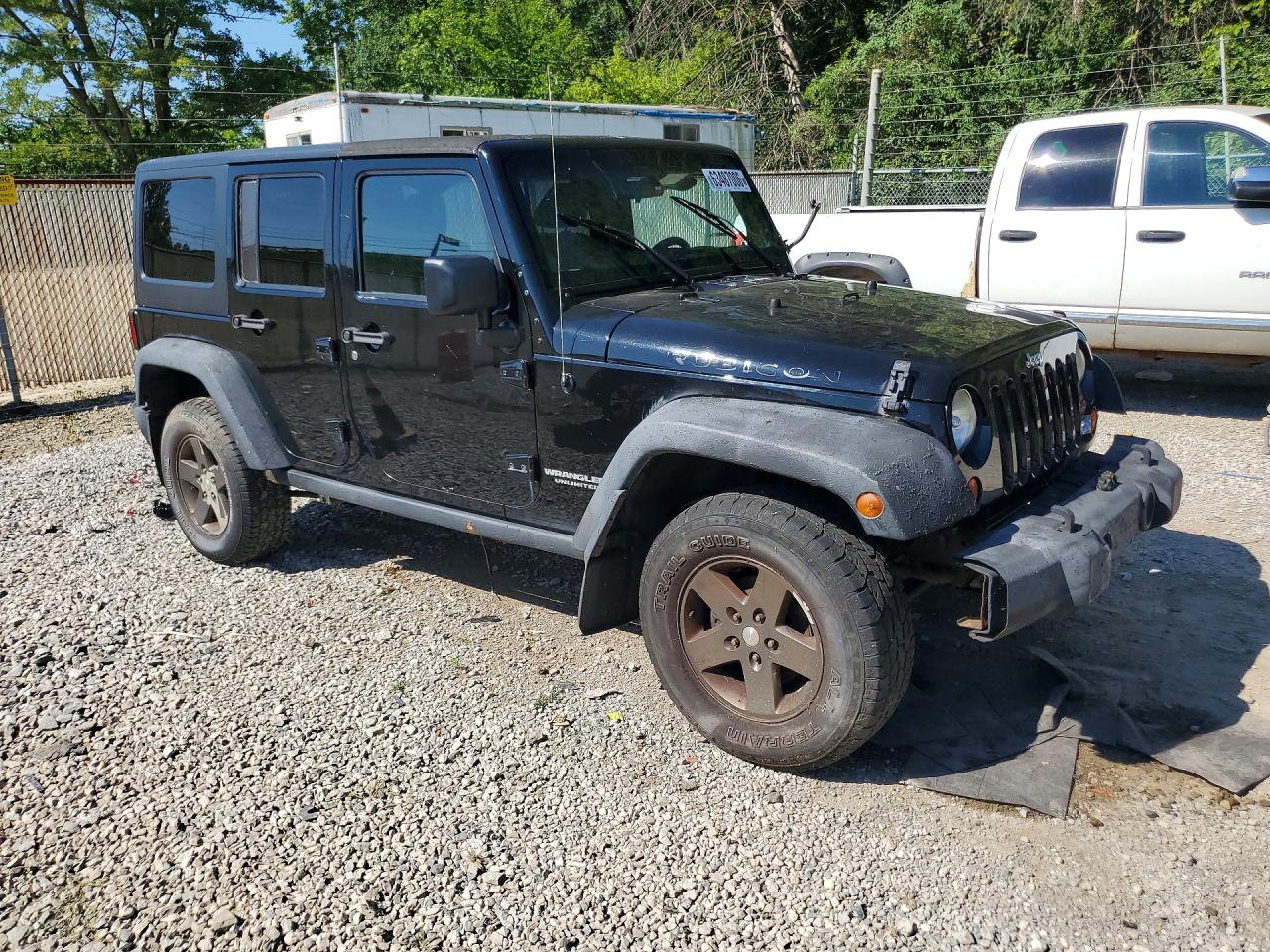 2012 Jeep Wrangler Unlimited Rubicon Black vin: 1C4BJWFG5CL104693