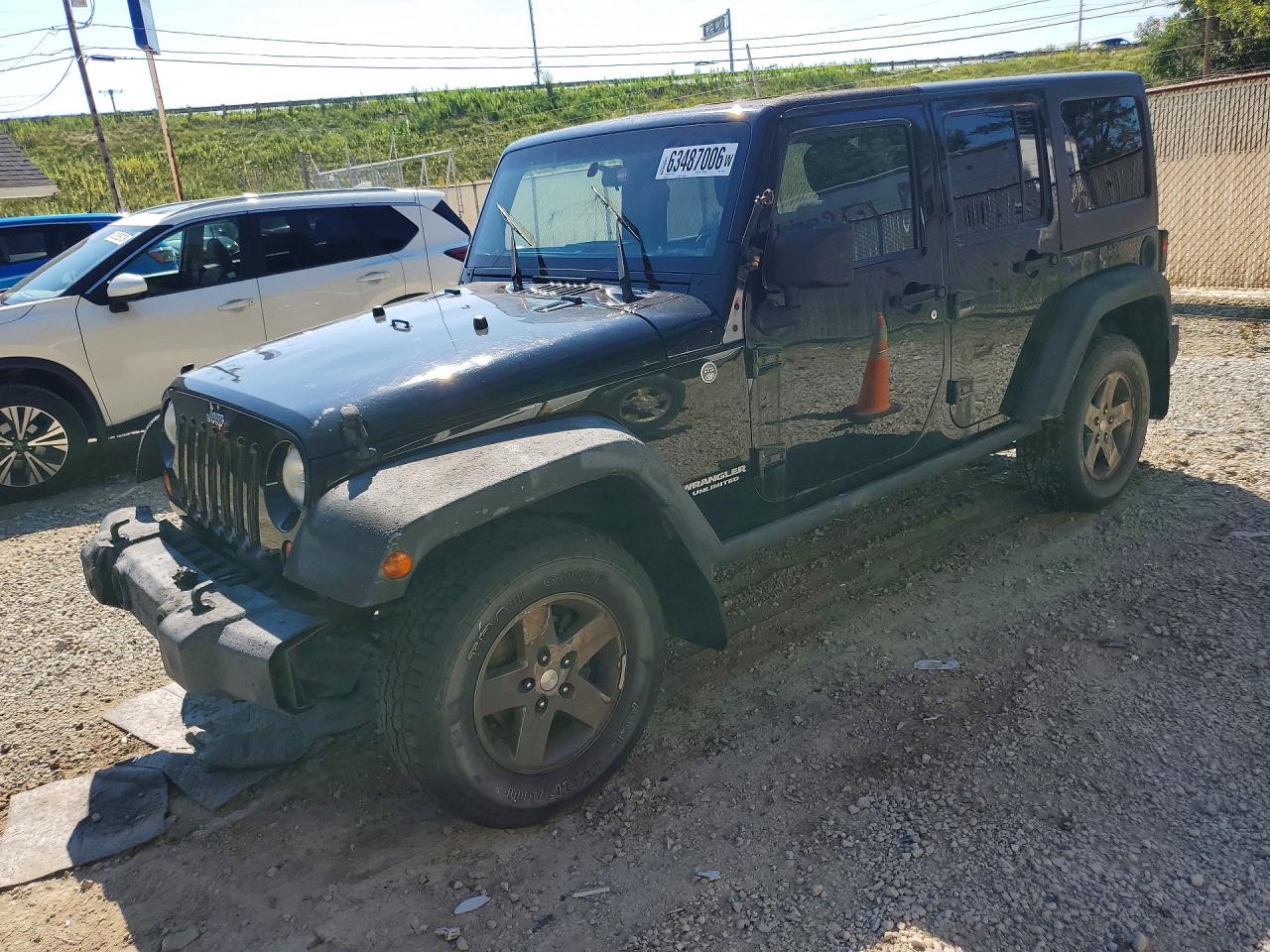2012 Jeep Wrangler Unlimited Rubicon Black vin: 1C4BJWFG5CL104693