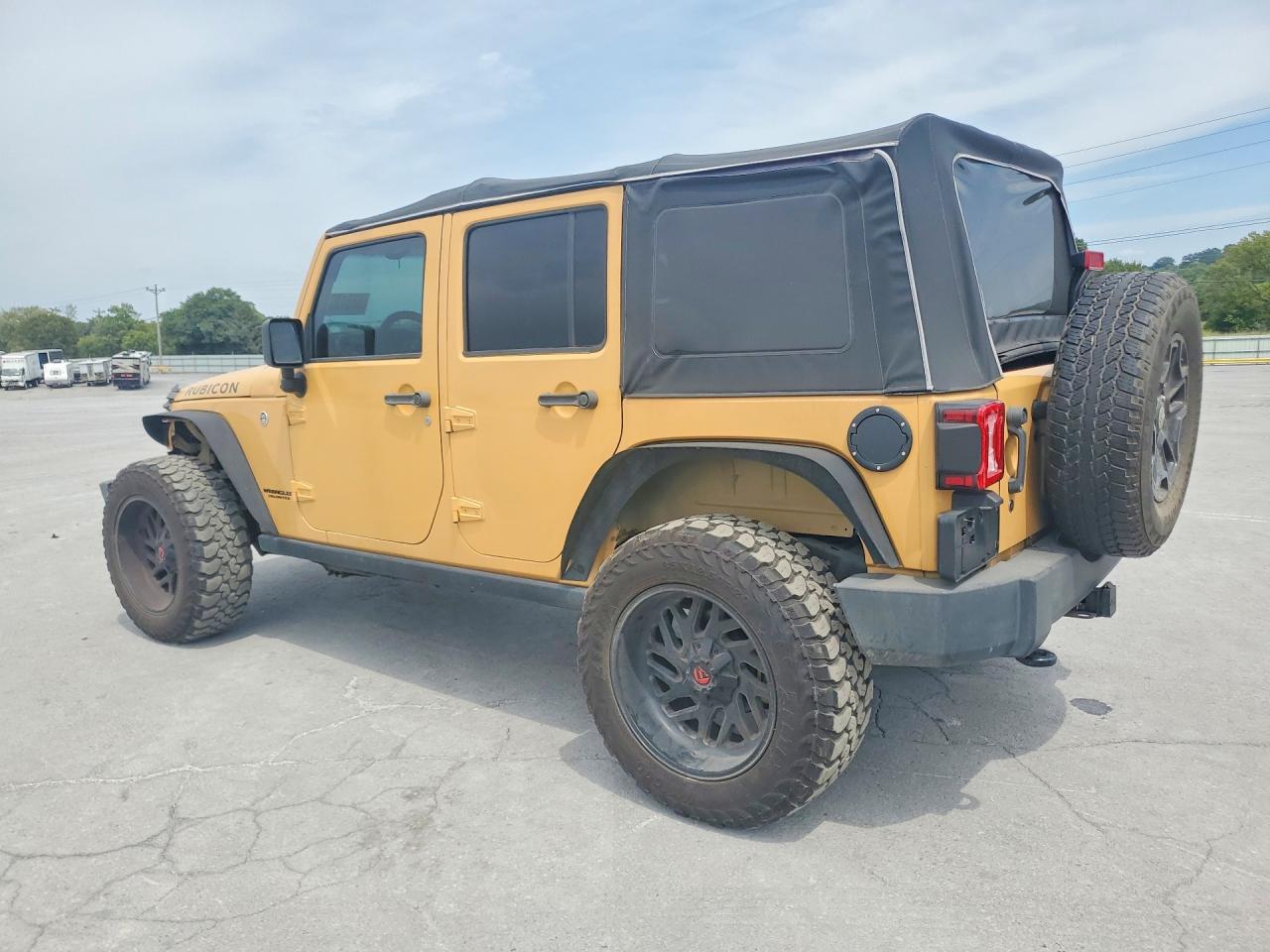 2014 Jeep Wrangler Unlimited Rubicon Желто-коричневый vin: 1C4BJWFG5EL101375