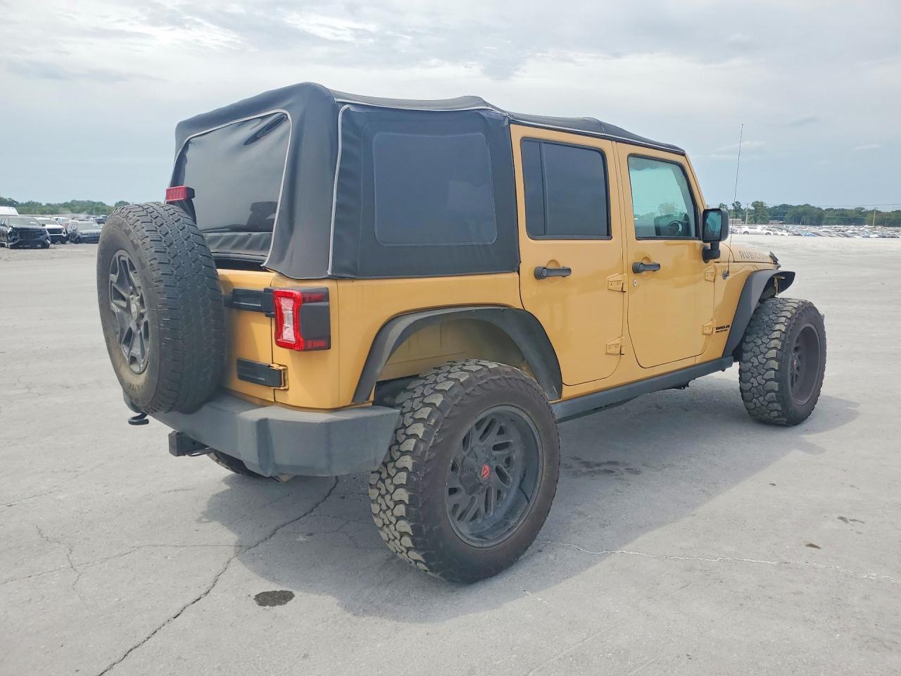2014 Jeep Wrangler Unlimited Rubicon Желто-коричневый vin: 1C4BJWFG5EL101375