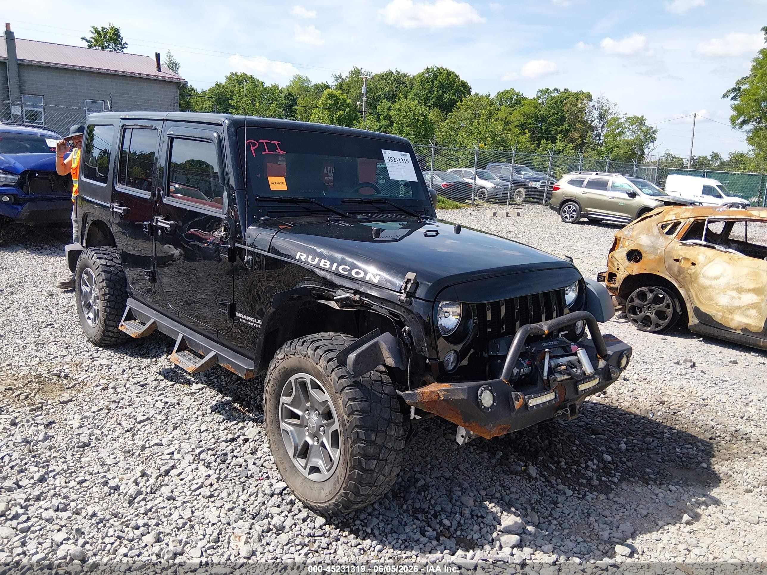 2015 Jeep Wrangler Unlimited Rubicon Черный vin: 1C4BJWFG7FL612300