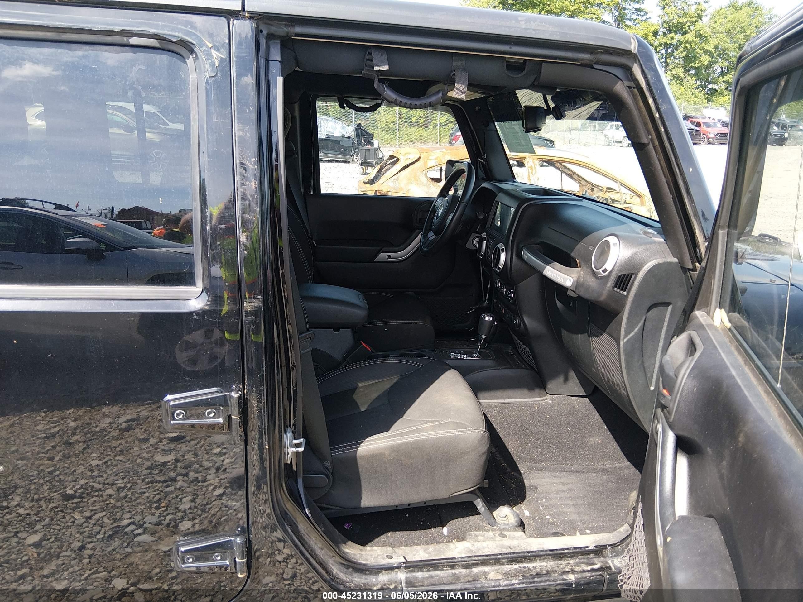 2015 Jeep Wrangler Unlimited Rubicon Черный vin: 1C4BJWFG7FL612300