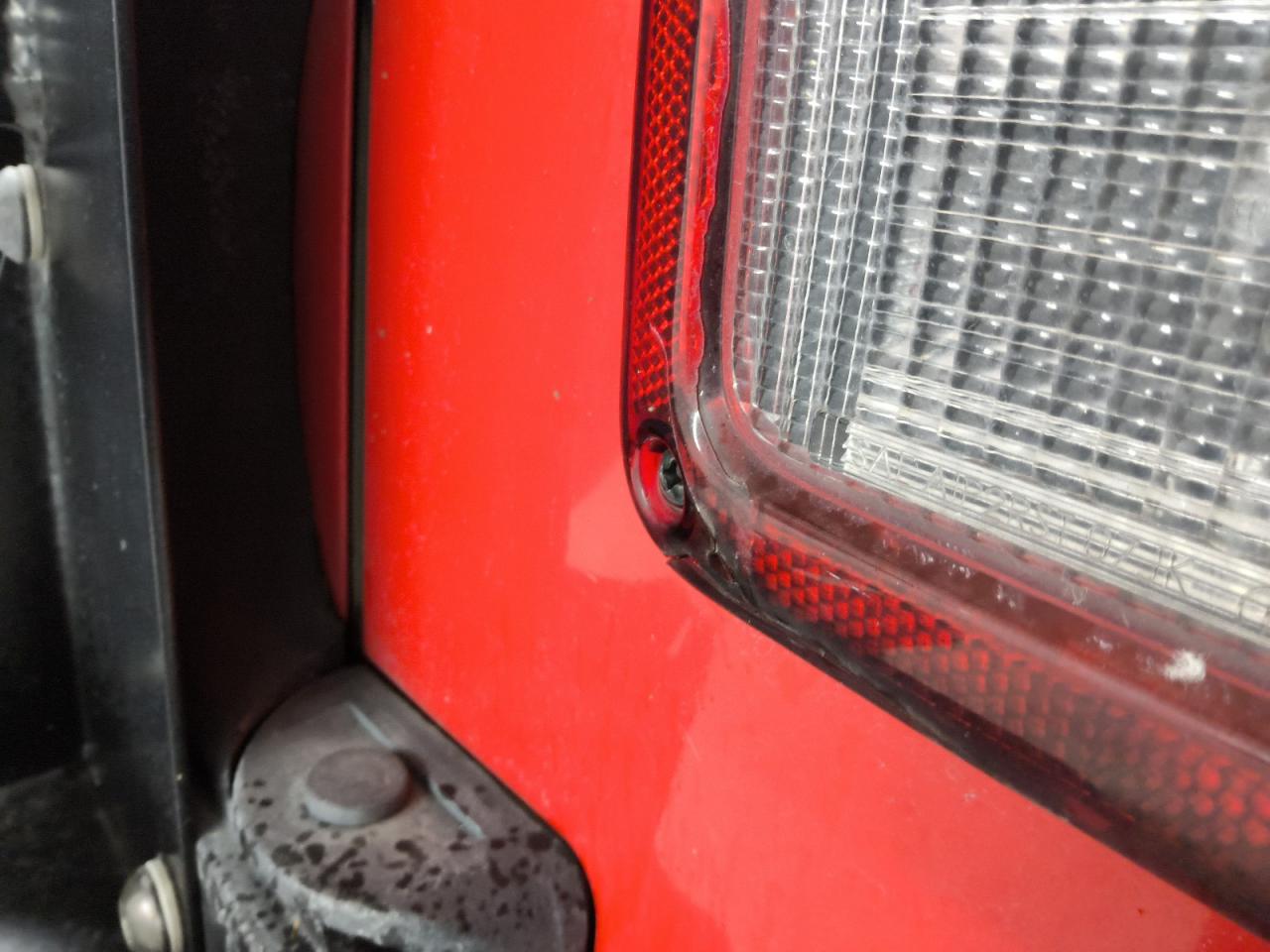 2015 Jeep Wrangler Unlimited Rubicon Red vin: 1C4BJWFG8FL598102 Damage: Right Tail Light, Broken, Replacement Required