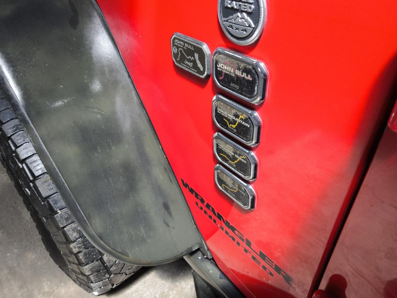 2015 Jeep Wrangler Unlimited Rubicon Red vin: 1C4BJWFG8FL598102 Damage: Left Front Fender, Multiple Dents/Paint Damage, 4