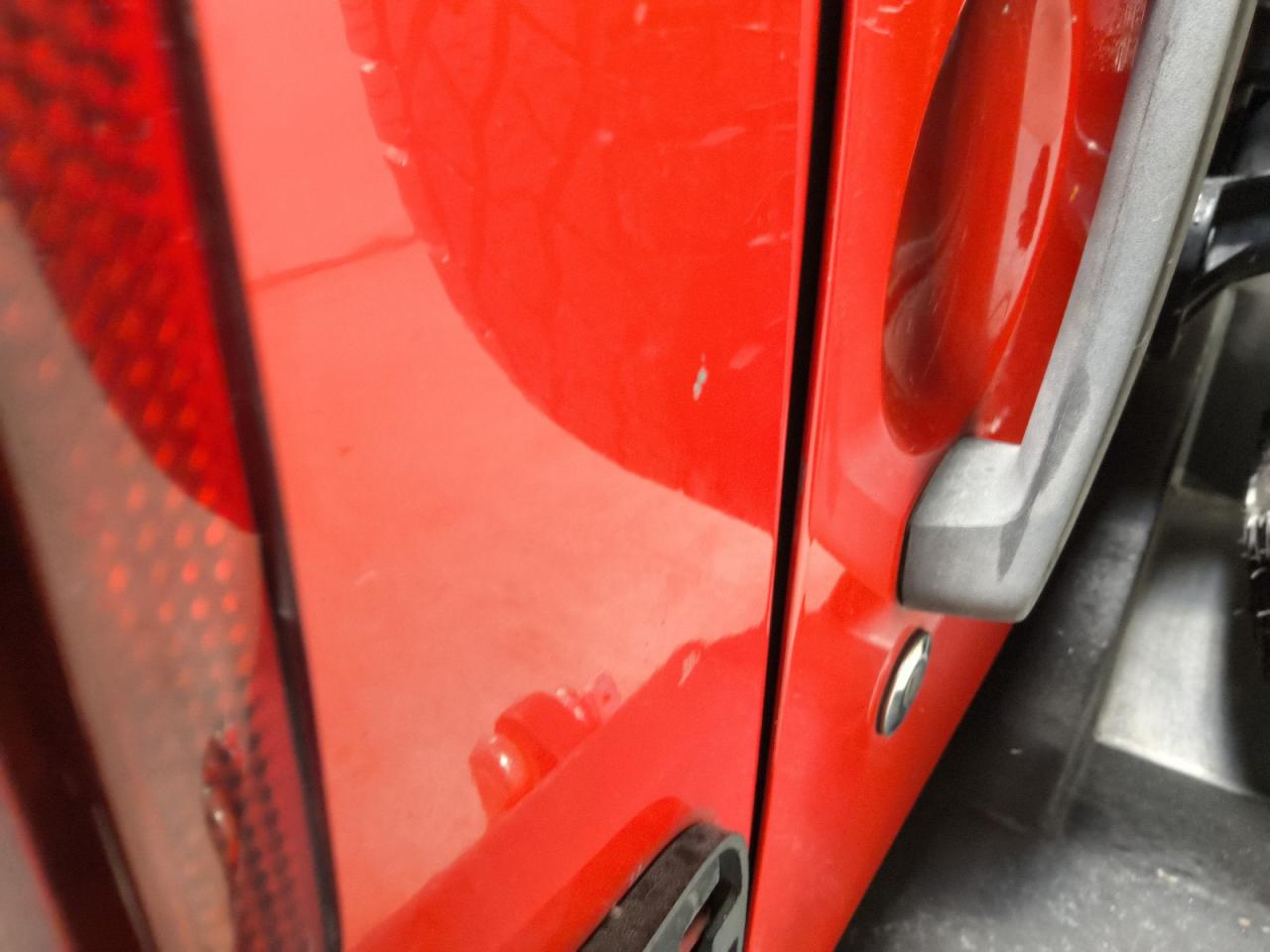 2015 Jeep Wrangler Unlimited Rubicon Red vin: 1C4BJWFG8FL598102 Damage: Left Qtr Panel, Chipped, 3