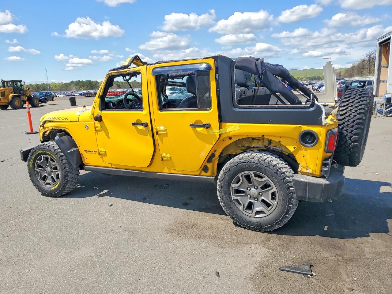 2015 Jeep Wrangler Unlimited Rubicon Yellow vin: 1C4BJWFG9FL566243