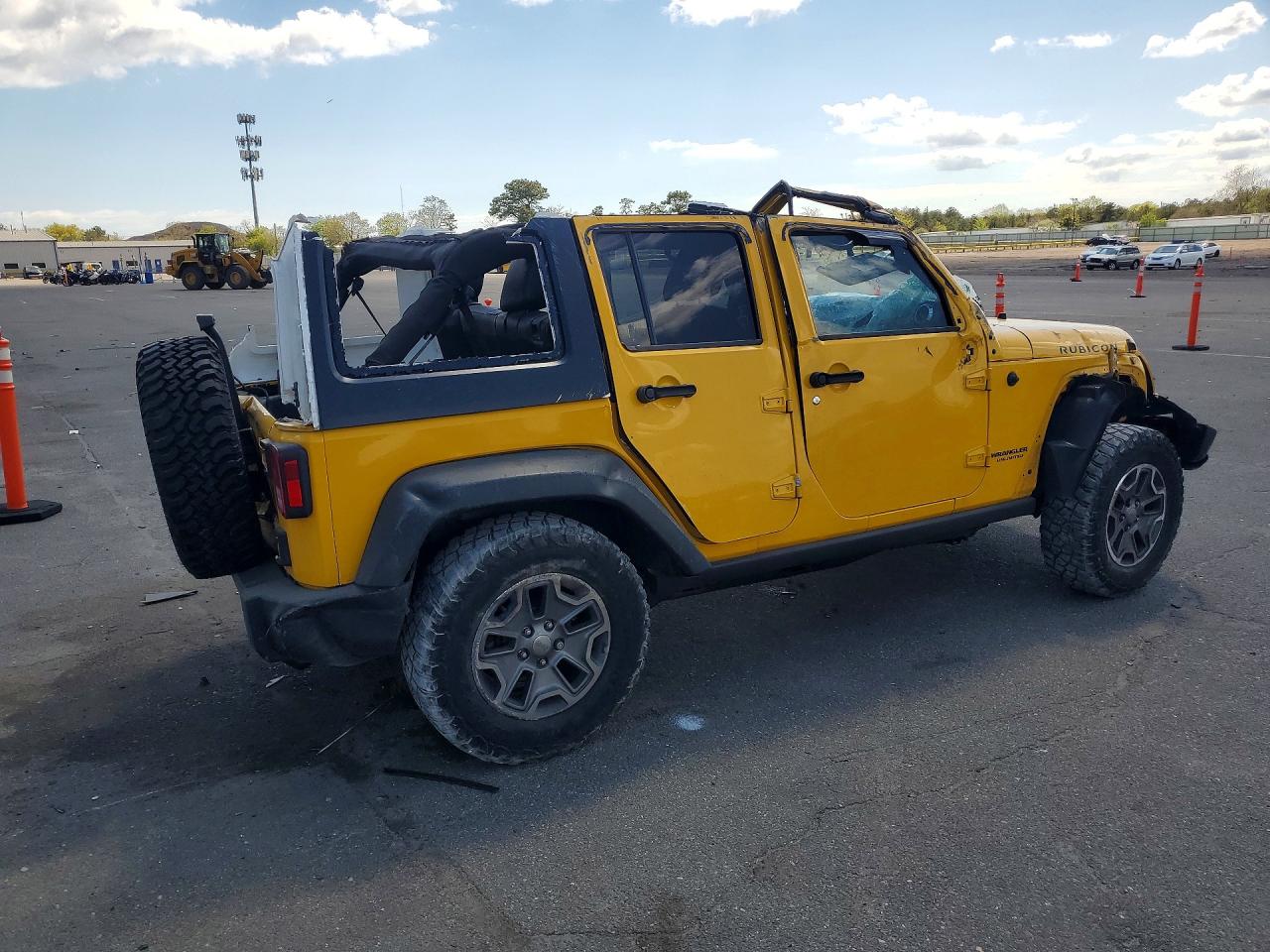 2015 Jeep Wrangler Unlimited Rubicon Yellow vin: 1C4BJWFG9FL566243