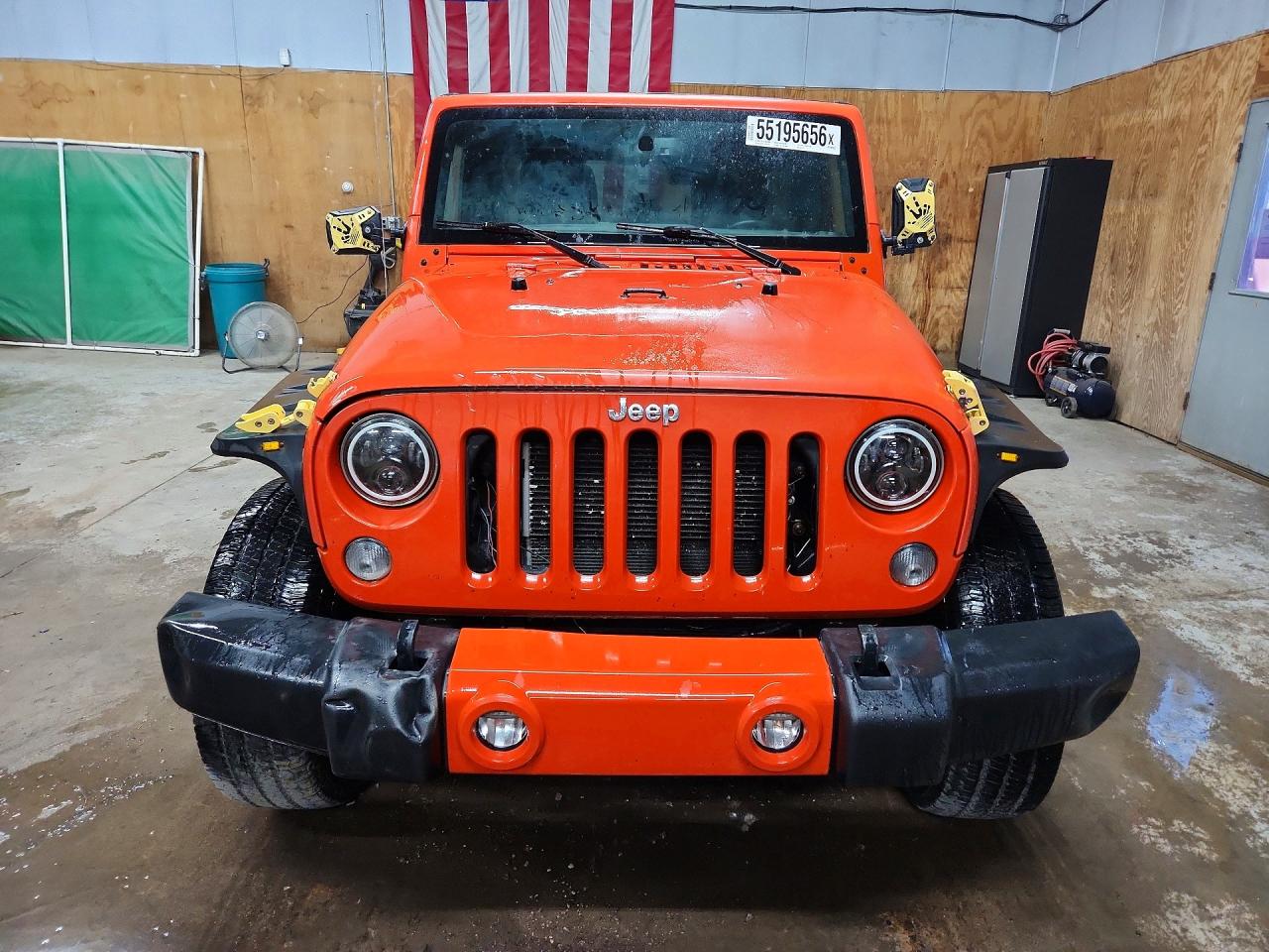 2015 Jeep Wrangler Unlimited Rubicon Orange vin: 1C4BJWFG9FL697916