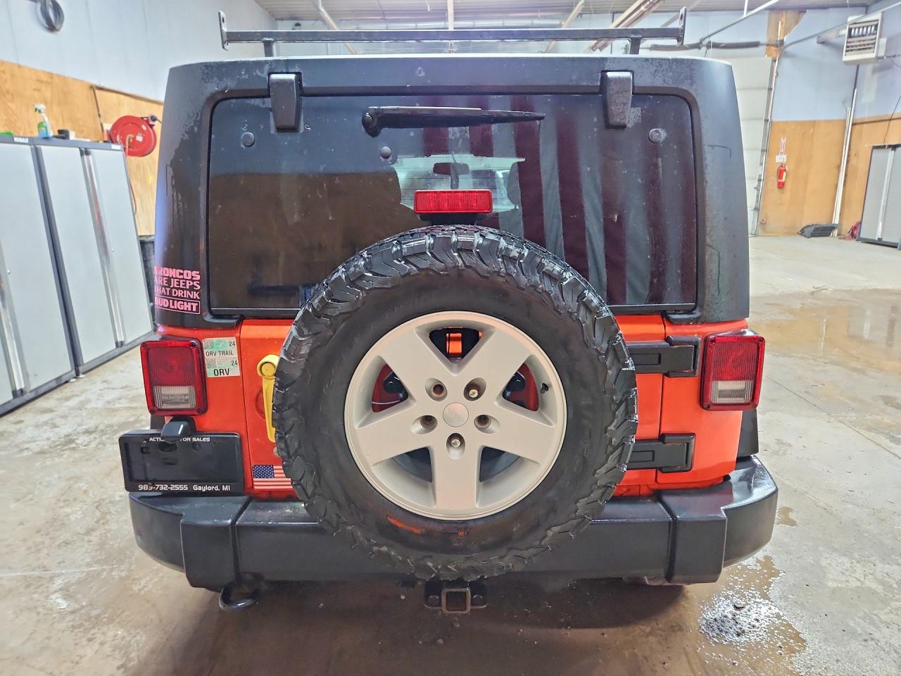 2015 Jeep Wrangler Unlimited Rubicon Orange vin: 1C4BJWFG9FL697916
