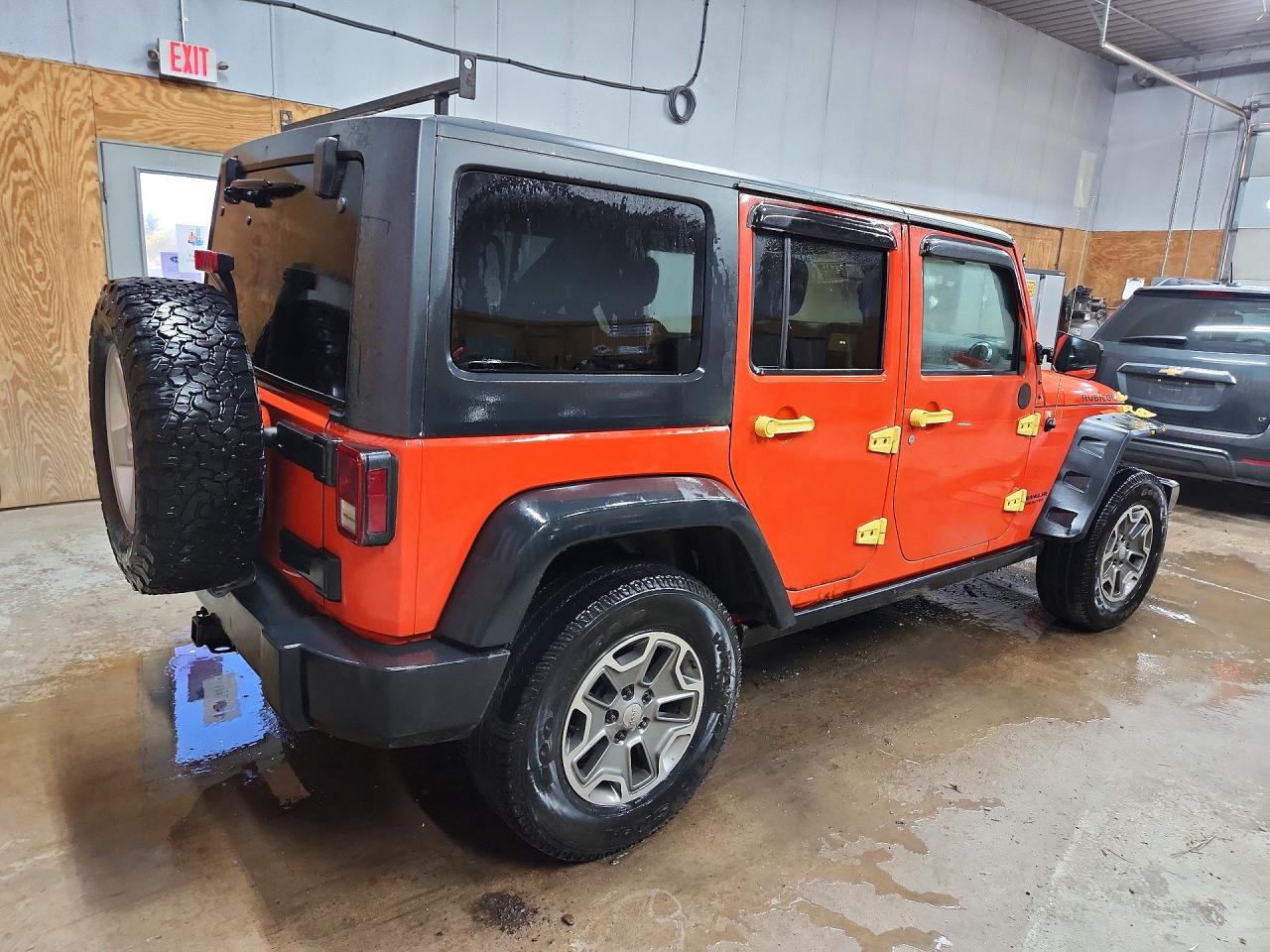 2015 Jeep Wrangler Unlimited Rubicon Orange vin: 1C4BJWFG9FL697916