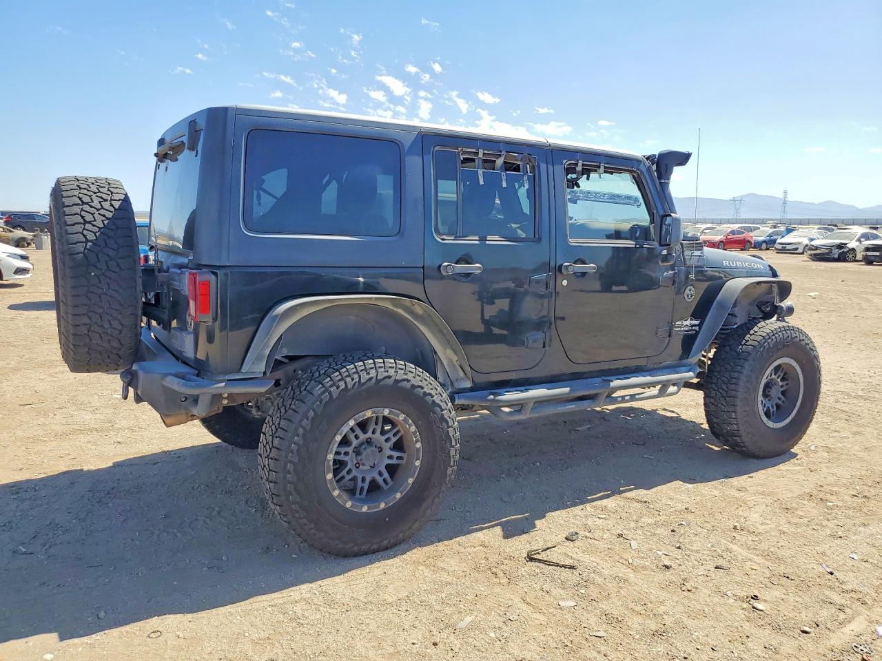 2012 Jeep Wrangler Unlimited Rubicon Black vin: 1C4BJWFGXCL178580
