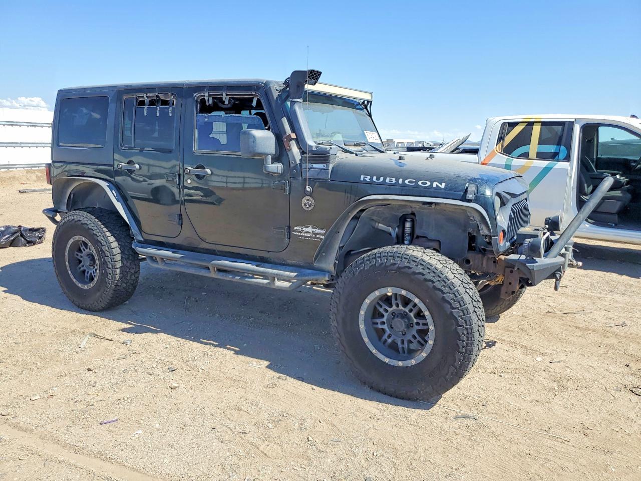 2012 Jeep Wrangler Unlimited Rubicon Black vin: 1C4BJWFGXCL178580
