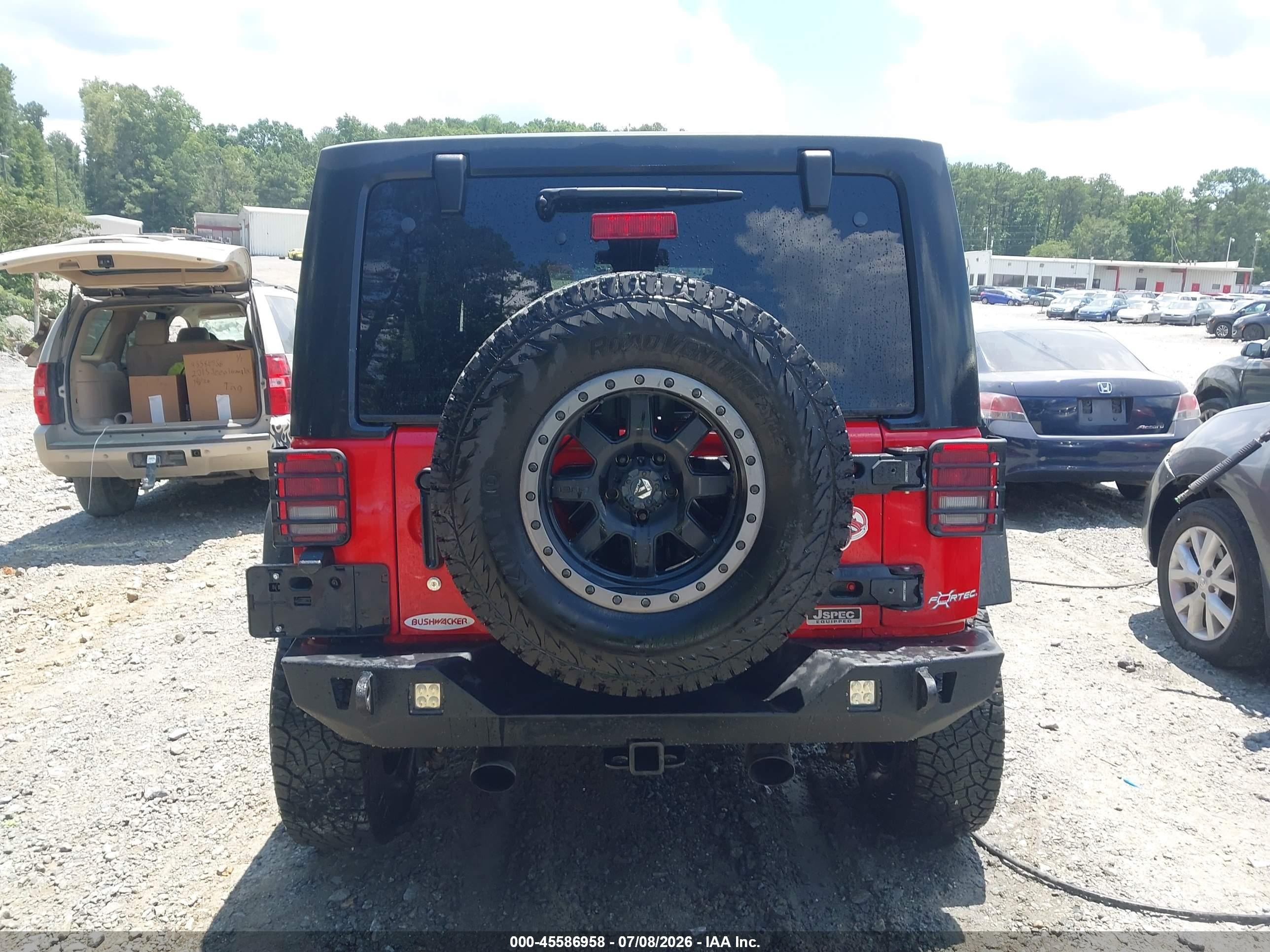 2015 Jeep Wrangler Unlimited Rubicon Red vin: 1C4BJWFGXFL562119