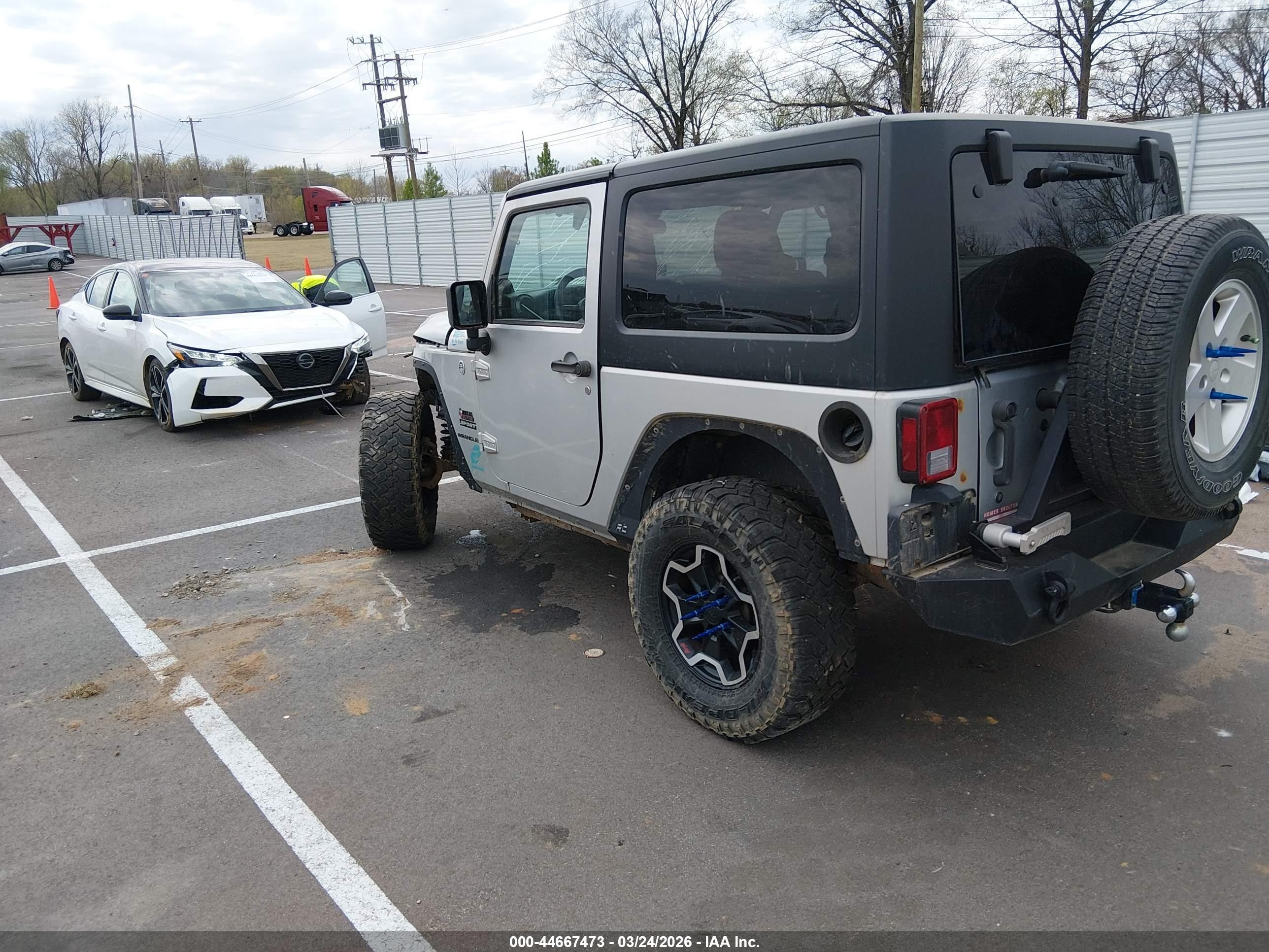 2012 Jeep Wrangler Sport Silver vin: 1C4GJWAG3CL109176