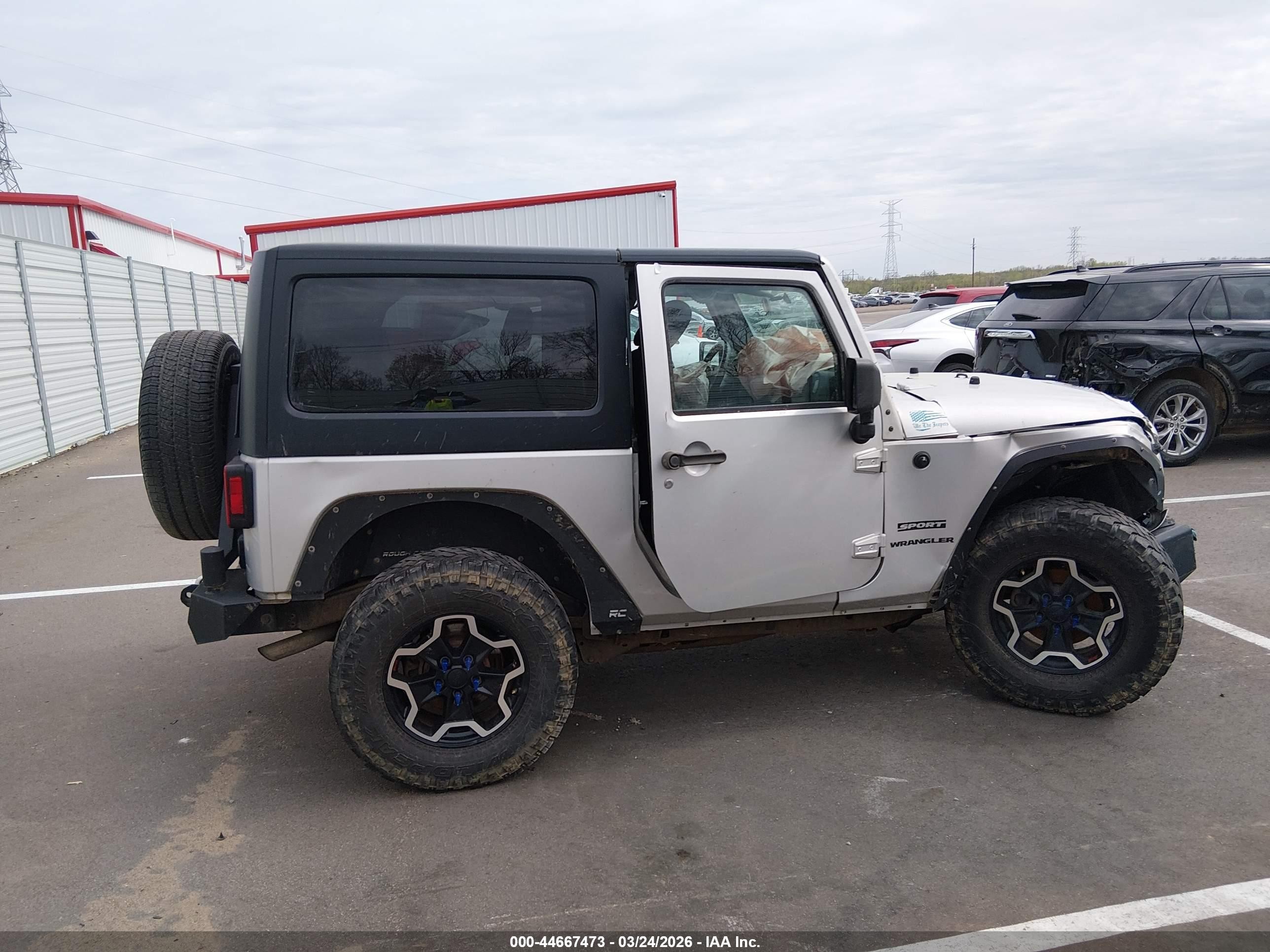 2012 Jeep Wrangler Sport Silver vin: 1C4GJWAG3CL109176