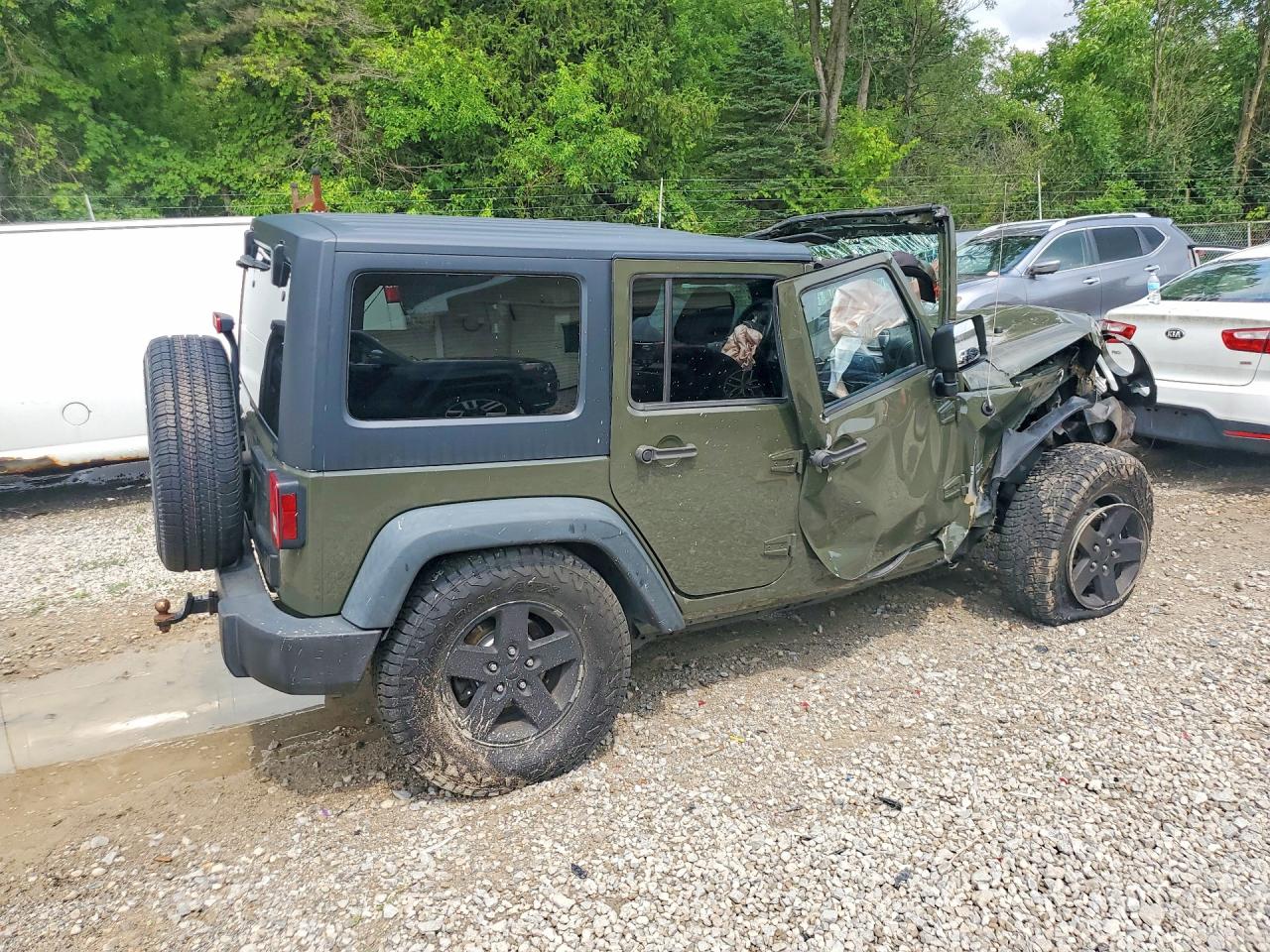 2015 Jeep Wrangler Unlimited Sport Green vin: 1C4HJWDG0FL603242